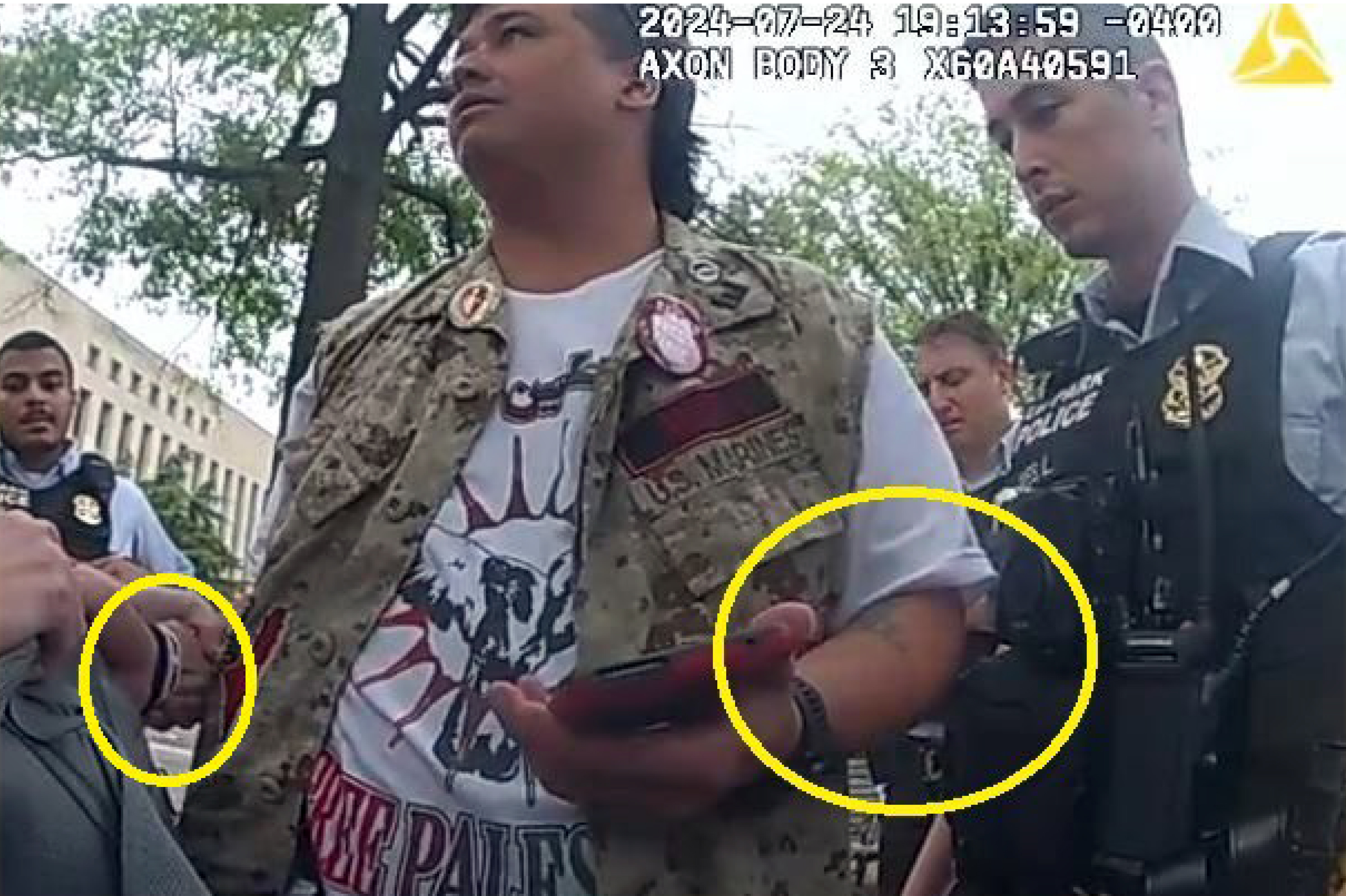 This image from police-worn body camera, and provided and annotated by the Justice Department, in the affidavit to support the criminal complaint and arrest warrant for Zachary Allen Kam, shows Kim during his arrest July 24, 2024, in Washington. (Department of Justice via AP)