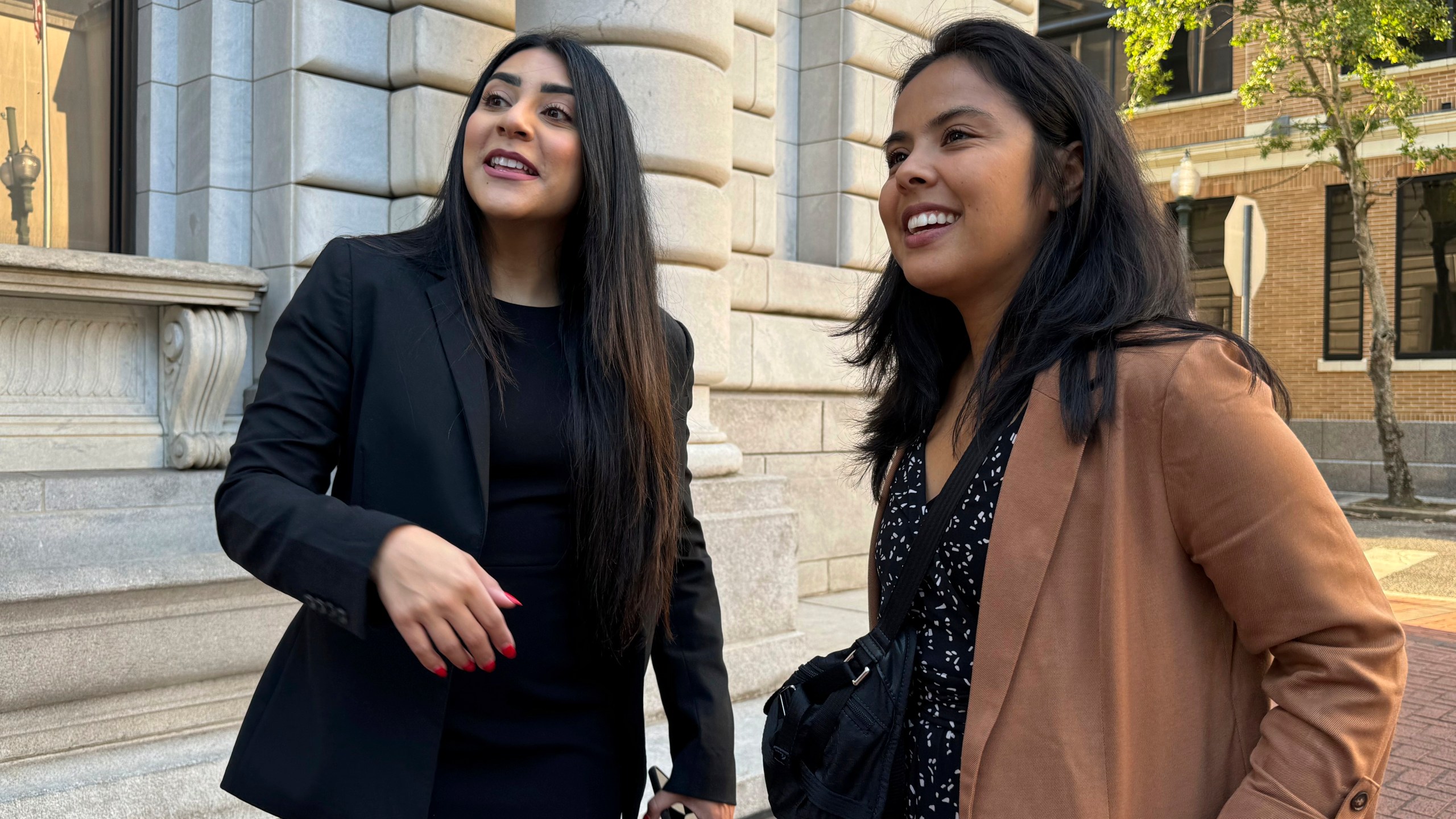 DACA-recipient María Rocha-Carrillo, 37, greets supporters outside federal appellate court in New Orleans on Thursday, Oct. 10, 2024. (AP Photo/Jack Brook)