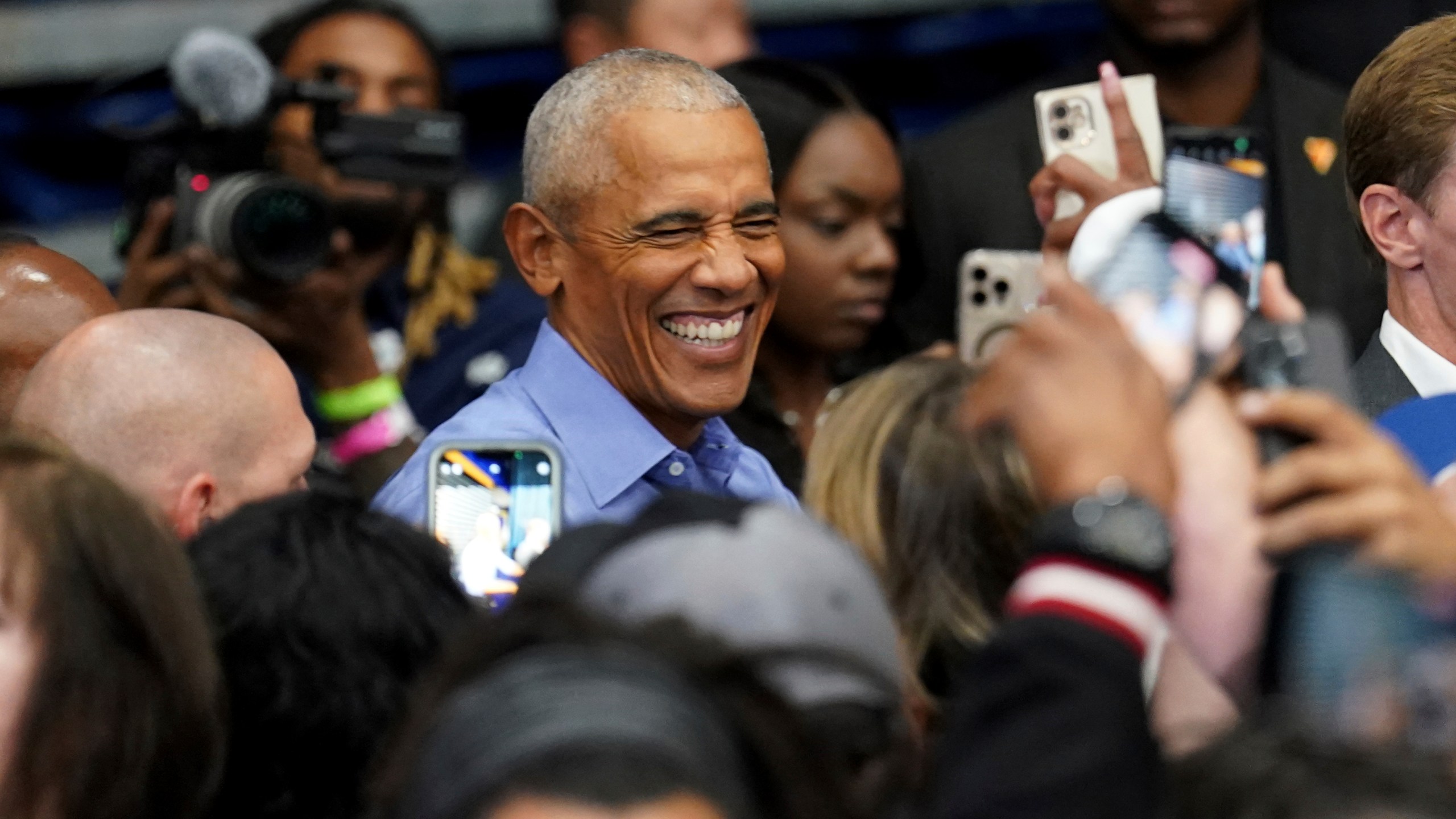 Former President Barack Obama greets attendees after speaking at a campaign rally supporting Democratic presidential nominee Vice President Kamala Harris, Thursday, Oct. 10, 2024, at the University of Pittsburgh's Fitzgerald Field House in Pittsburgh. (AP Photo/Matt Freed)