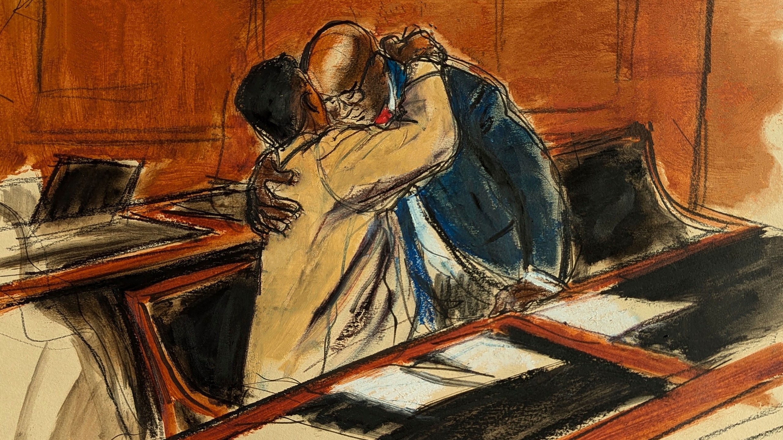 In this courtroom sketch, Sean "Diddy" Combs, left, upon entering the courtroom hugs his attorney Anthony Ricco prior to the hearing in Federal court in New York, Thursday, Oct. 10, 2024. (Elizabeth Williams via AP)