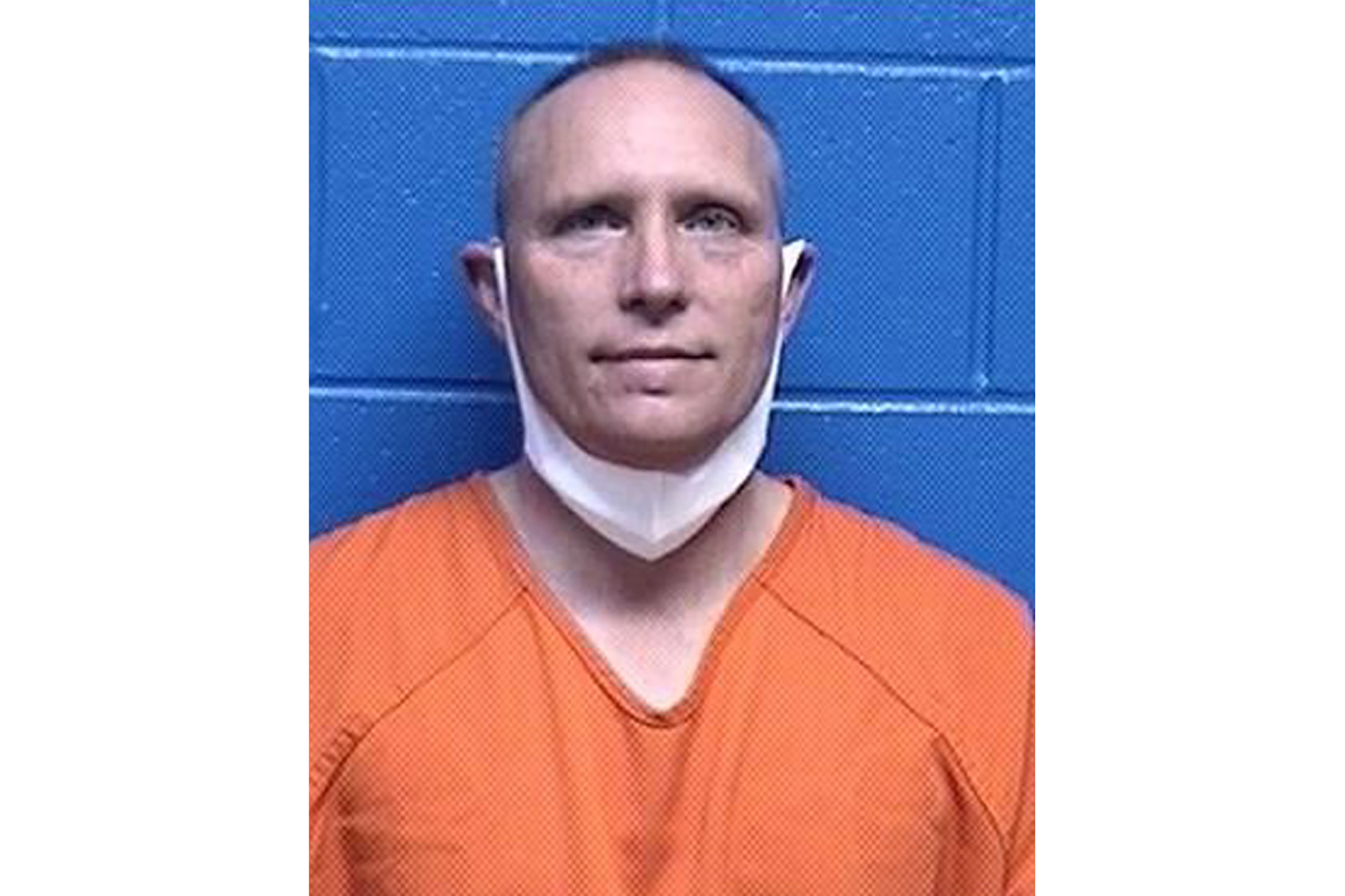 FILE - This booking photo released by the Missoula County, Mont., Detention Facility shows Henry Phillip Muntzer on Jan. 18, 2021. (Missoula County Detention Facility via AP, File)