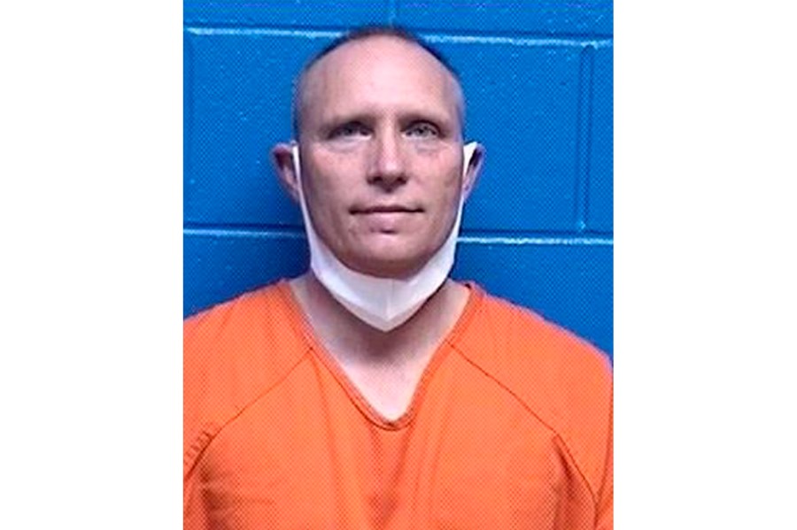 FILE - This booking photo released by the Missoula County, Mont., Detention Facility shows Henry Phillip Muntzer on Jan. 18, 2021. (Missoula County Detention Facility via AP, File)