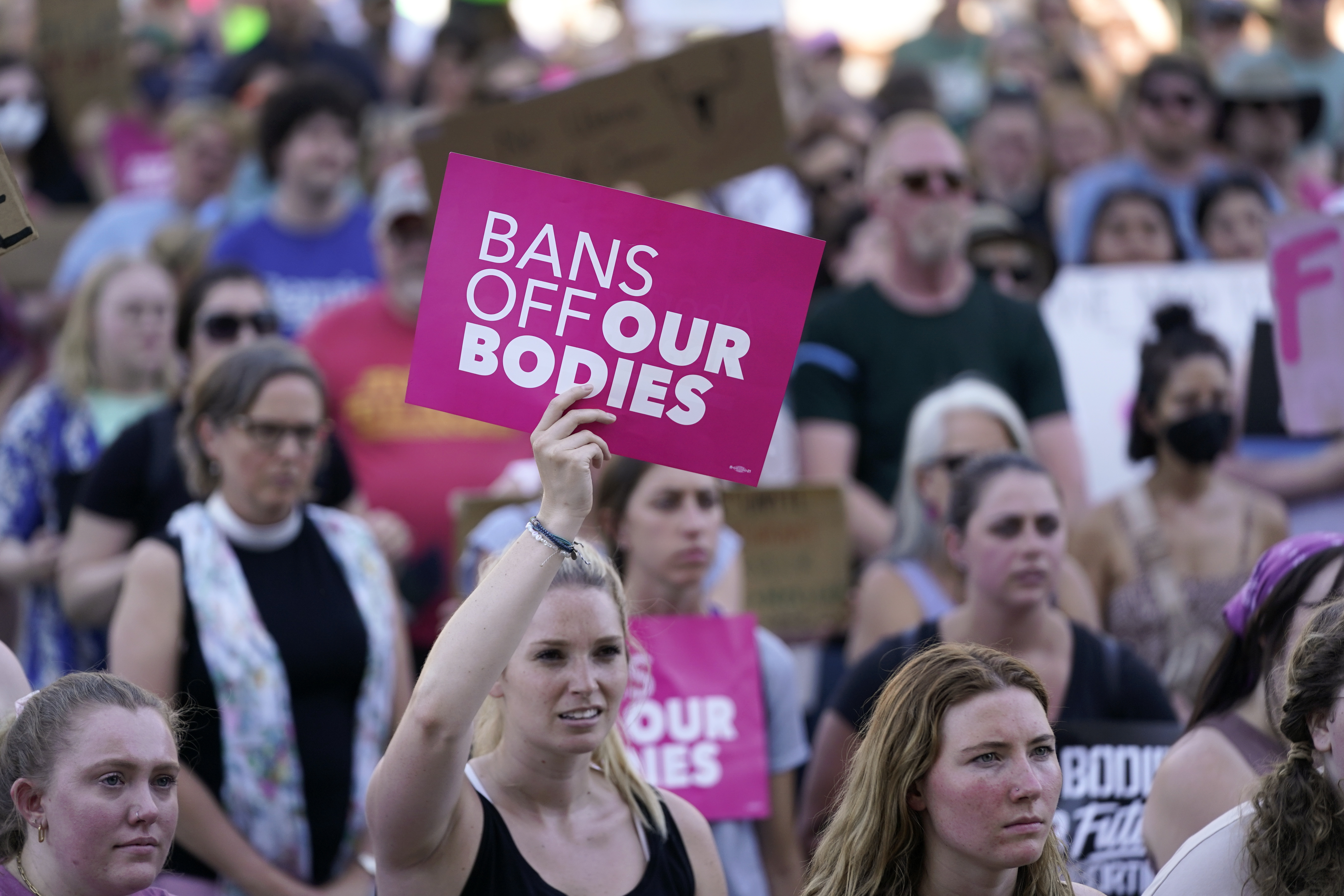 FILE - Abortion-rights protesters cheer at a rally outside the state capitol in Lansing, Mich., June 24, 2022. (AP Photo/Paul Sancya, File)