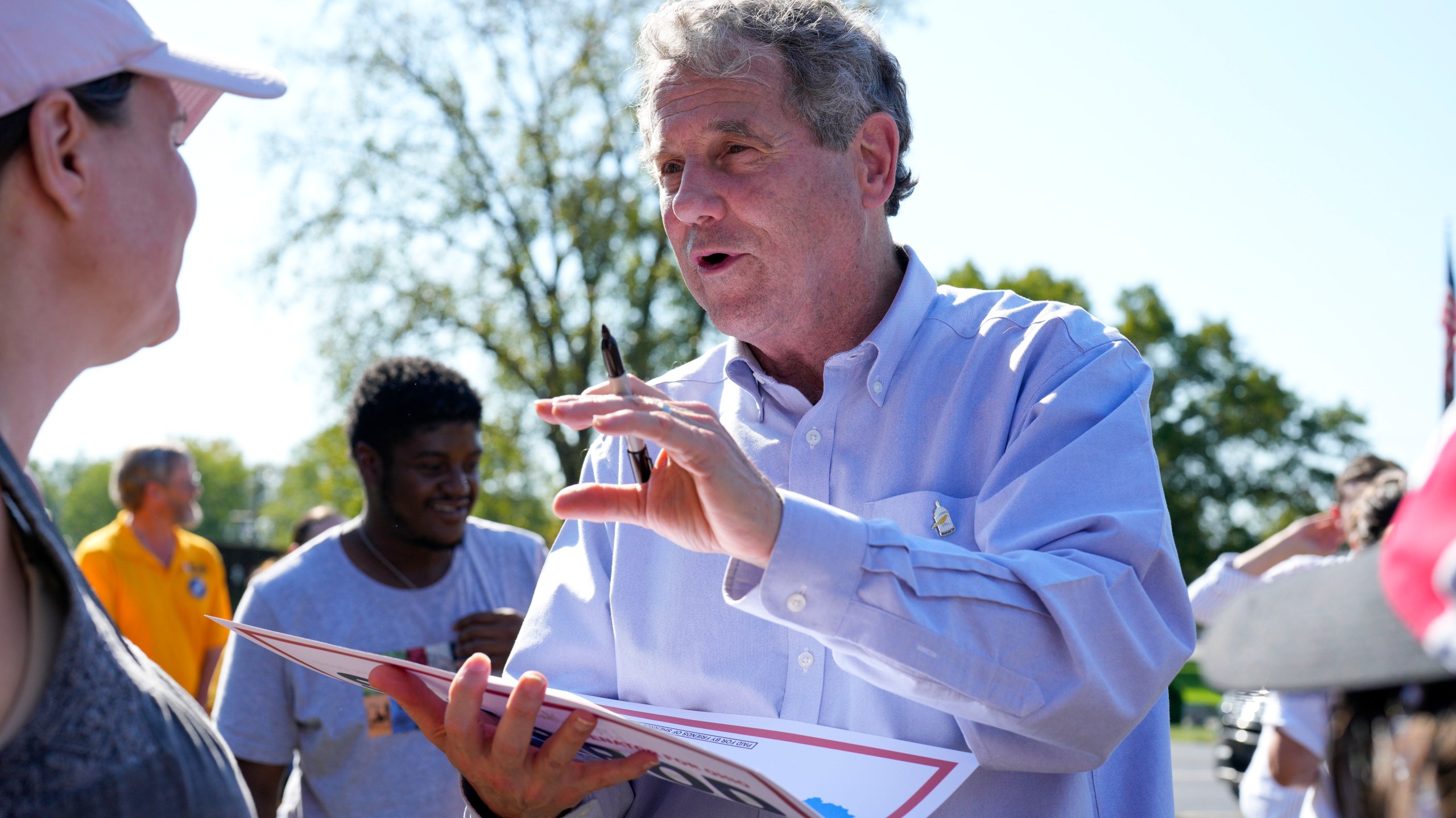 U.S. Sen. Sherrod Brown, D-Ohio, speaks with supporters at a campaign rally, Saturday, Oct. 5, 2024, in Cincinnati. (AP Photo/Jeff Dean)