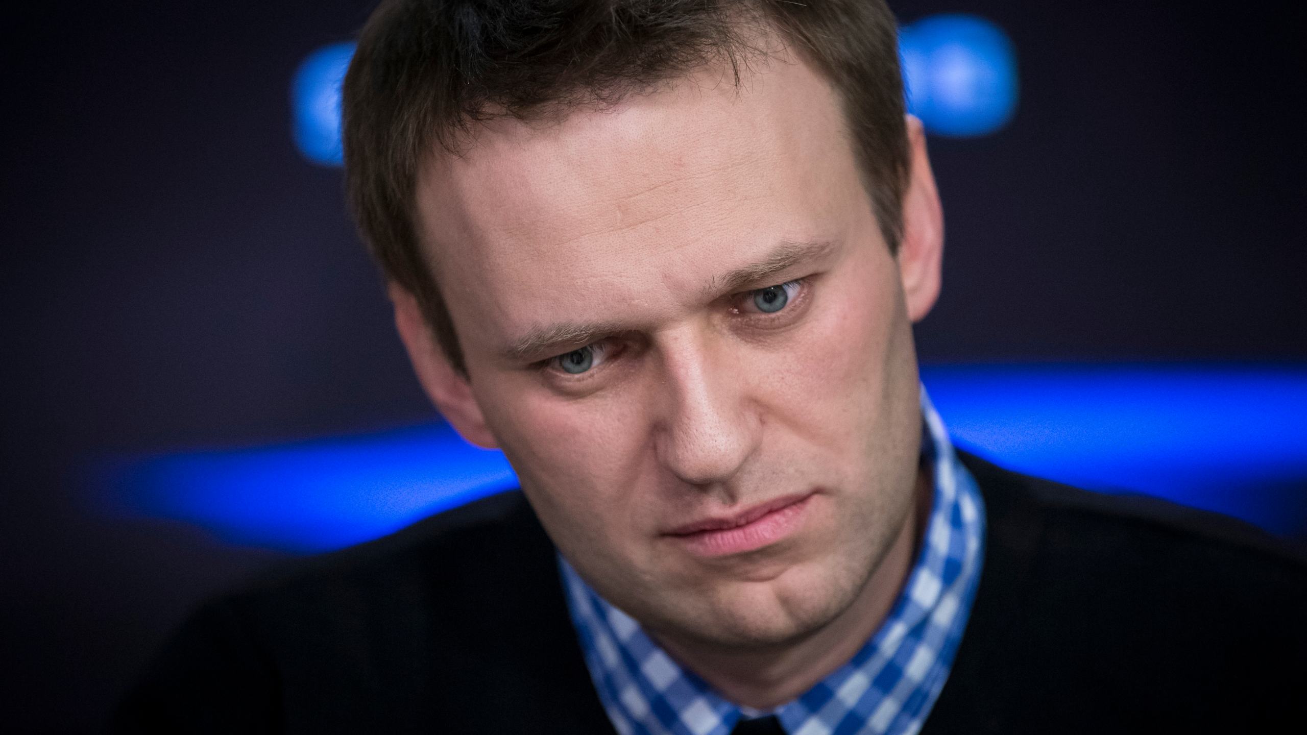 FILE - Russian opposition leader Alexey Navalny listens to a question during an interview at the Echo Moskvy (Echo of Moscow) radio station in Moscow, Russia, Monday, April 8, 2013. (AP Photo/Alexander Zemlianichenko, File)