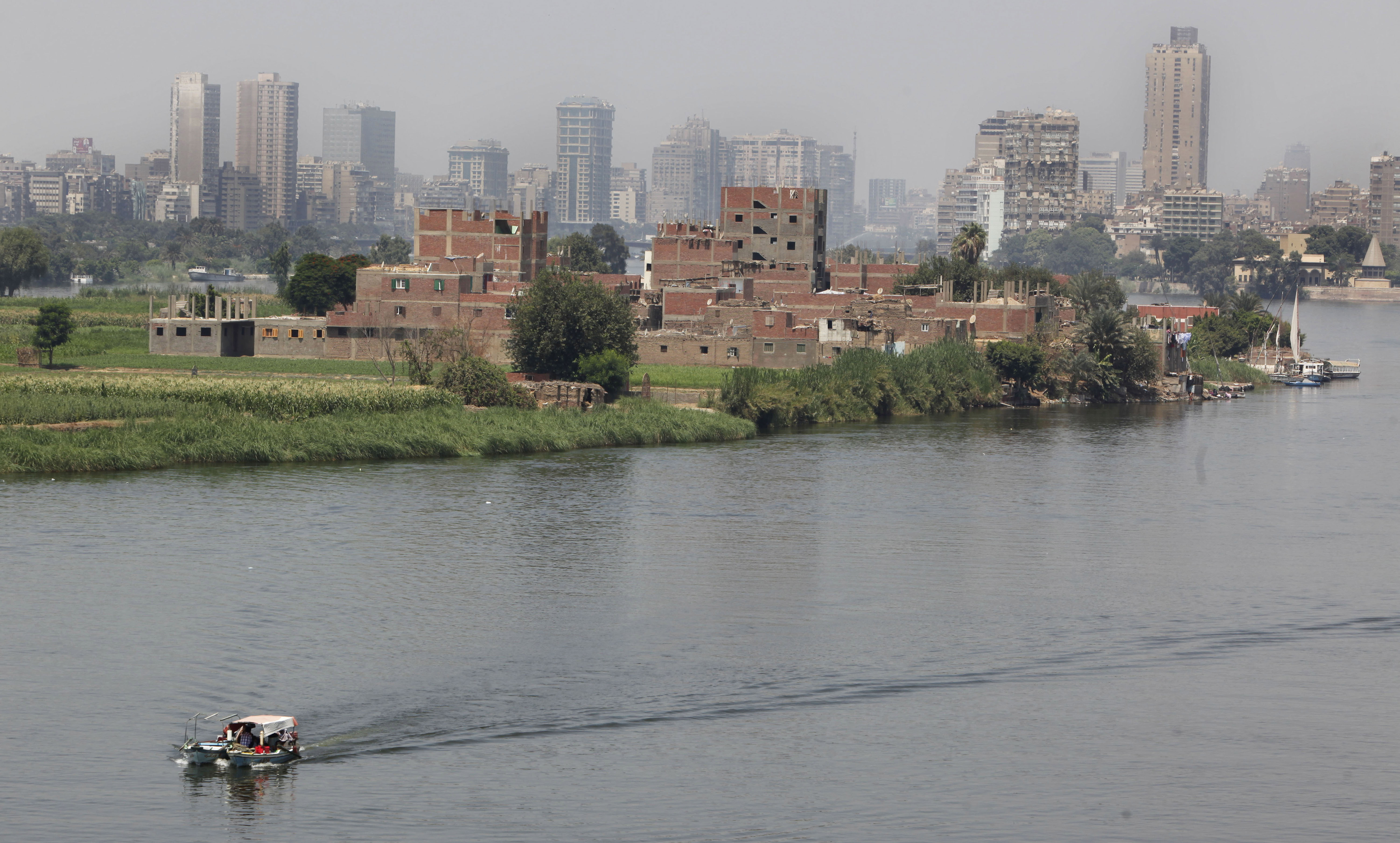 FILE - A fisherman's boat sails along the River Nile in Cairo, Egypt, Saturday, Sept. 3, 2011. (AP Photo/Amr Nabil, File)