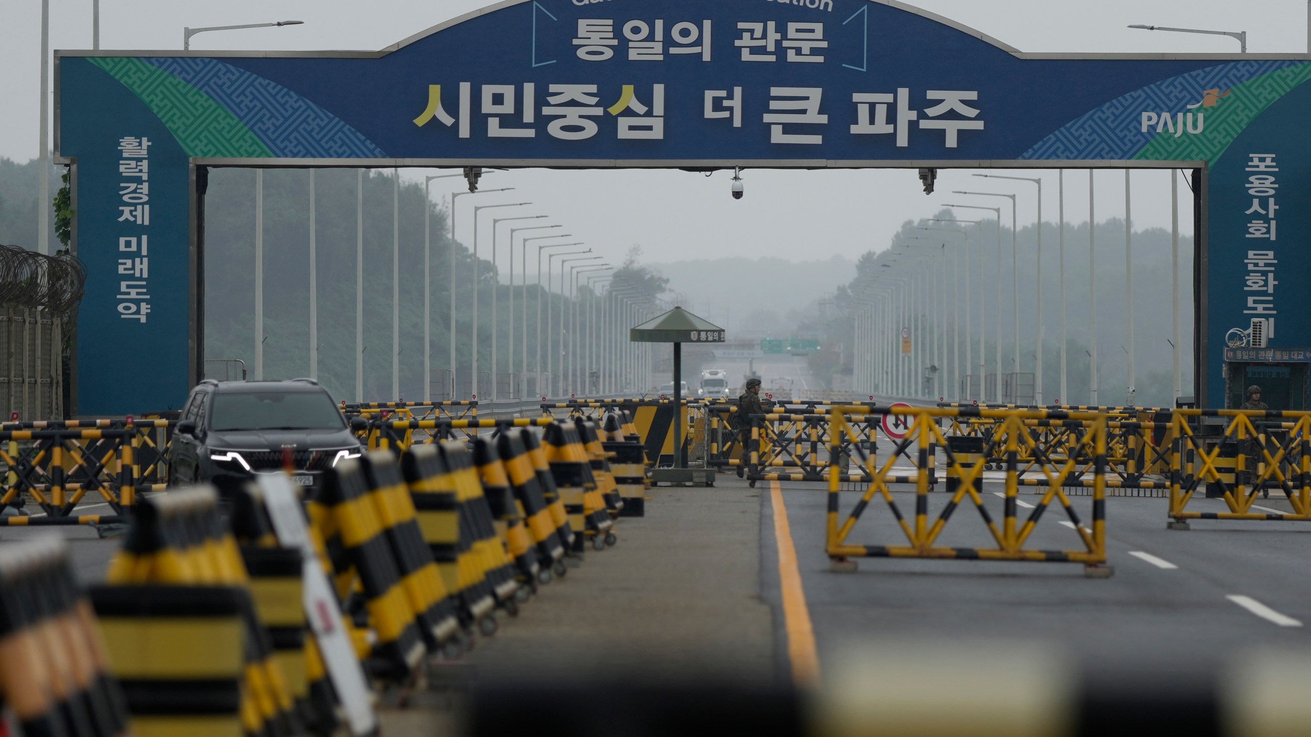 Barricades are placed near the Unification Bridge, which leads to the Panmunjom in the Demilitarized Zone in Paju, South Korea, Tuesday, Oct. 15, 2024. (AP Photo/Lee Jin-man)