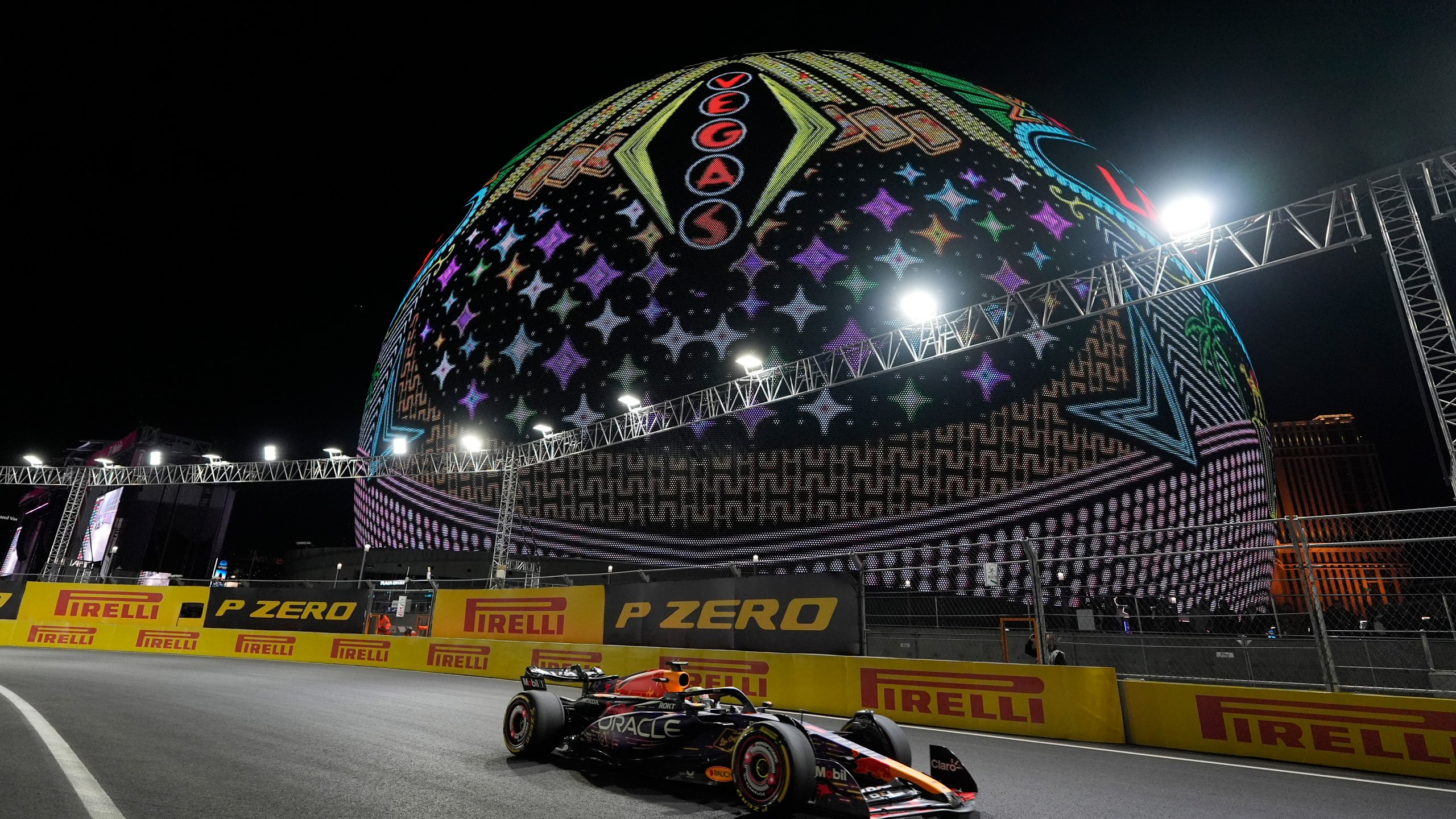 FILE - Red Bull driver Max Verstappen, of the Netherlands, drives past the Sphere during the Formula One Las Vegas Grand Prix auto race, on Nov. 18, 2023, in Las Vegas. (AP Photo/Nick Didlick, File)