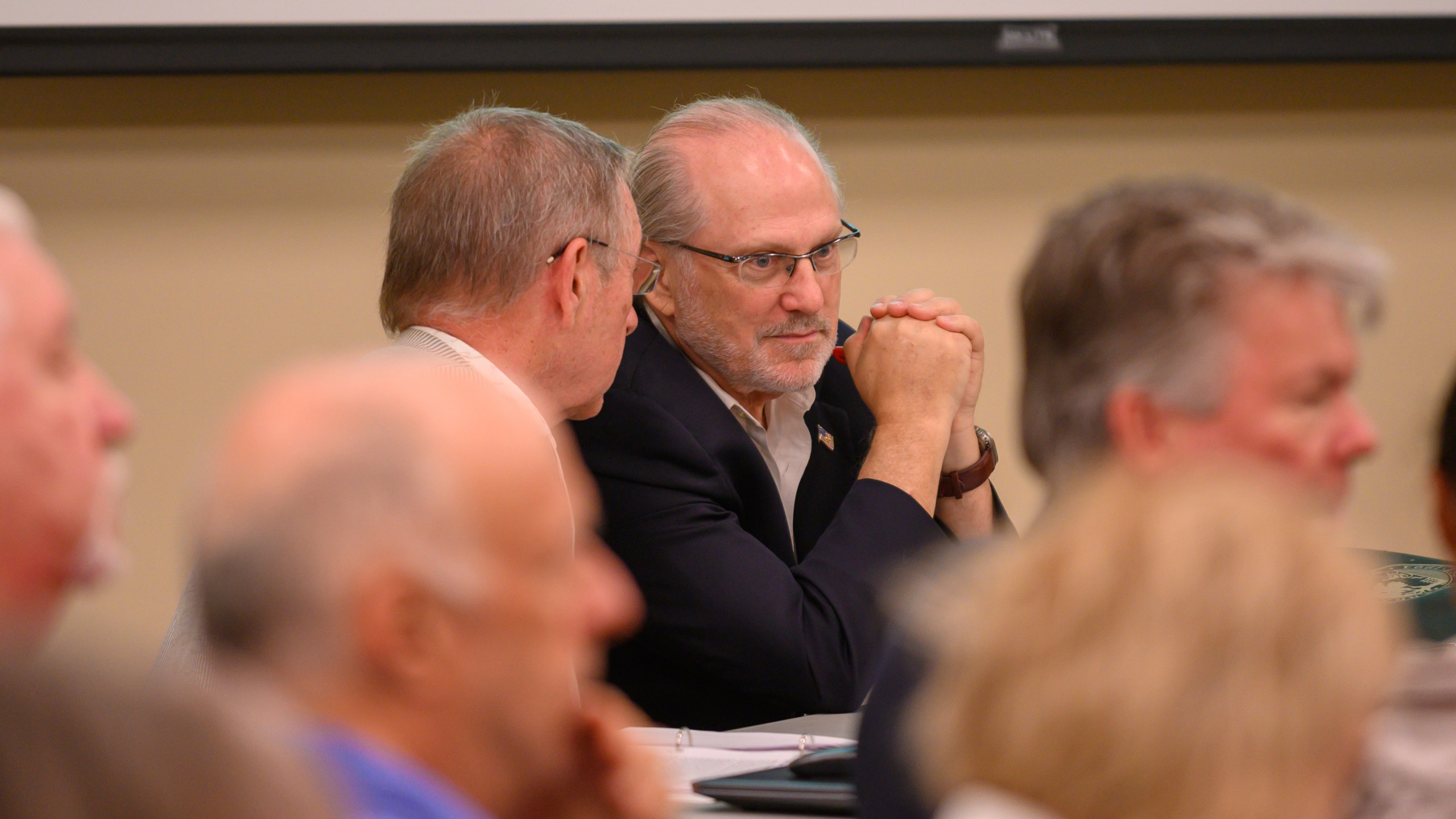 Challenger Steven Bartelski and EagleAI CEO Rick Richards present challenges to the Forsyth election board concerning the eligibility of 800 voters at the Forsyth County Voter Registrar in Cumming, Ga., June 28, 2024. (Jamie Spaar /Atlanta Journal-Constitution via AP)