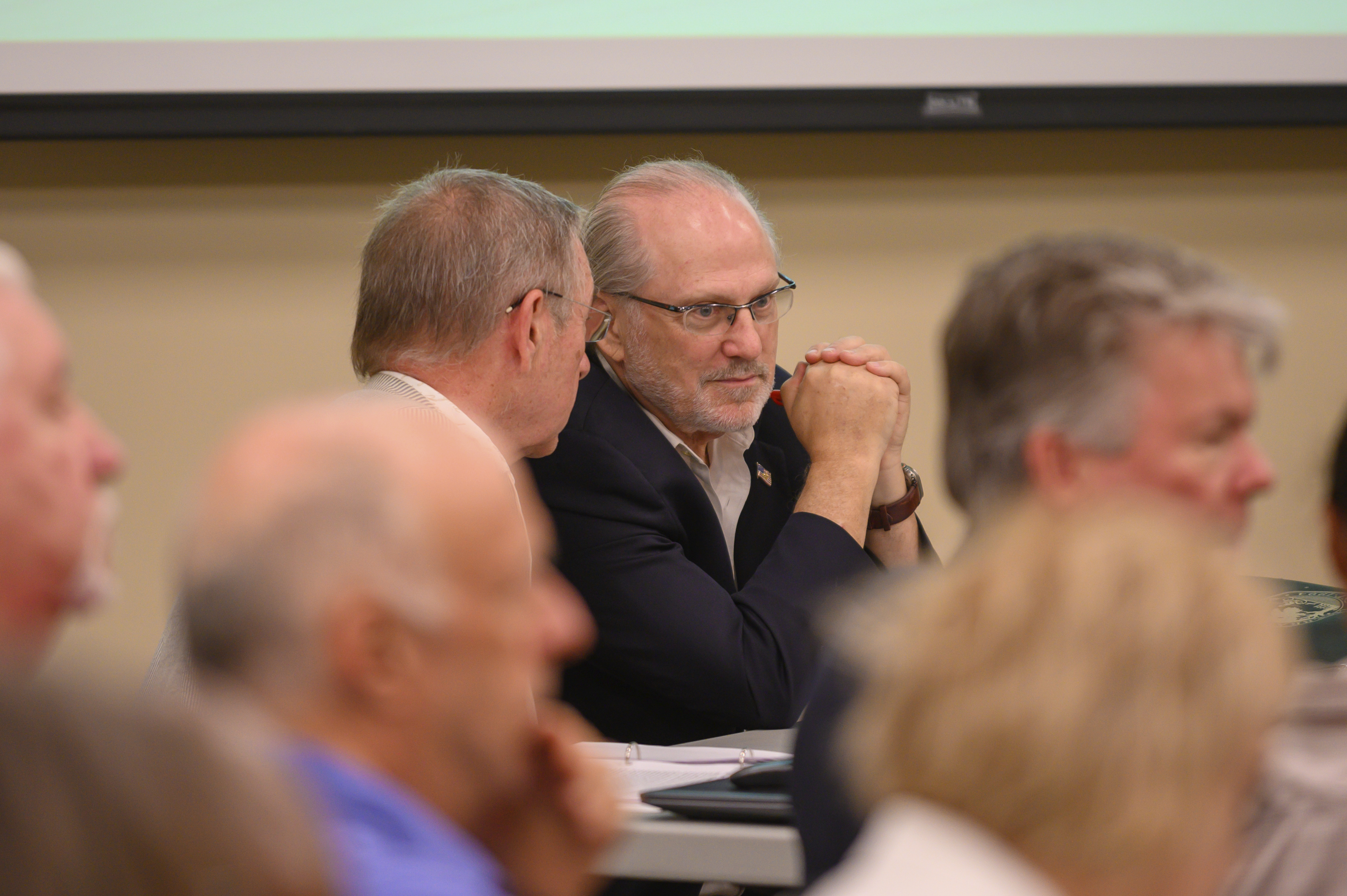 Challenger Steven Bartelski and EagleAI CEO Rick Richards present challenges to the Forsyth election board concerning the eligibility of 800 voters at the Forsyth County Voter Registrar in Cumming, Ga., June 28, 2024. (Jamie Spaar /Atlanta Journal-Constitution via AP)