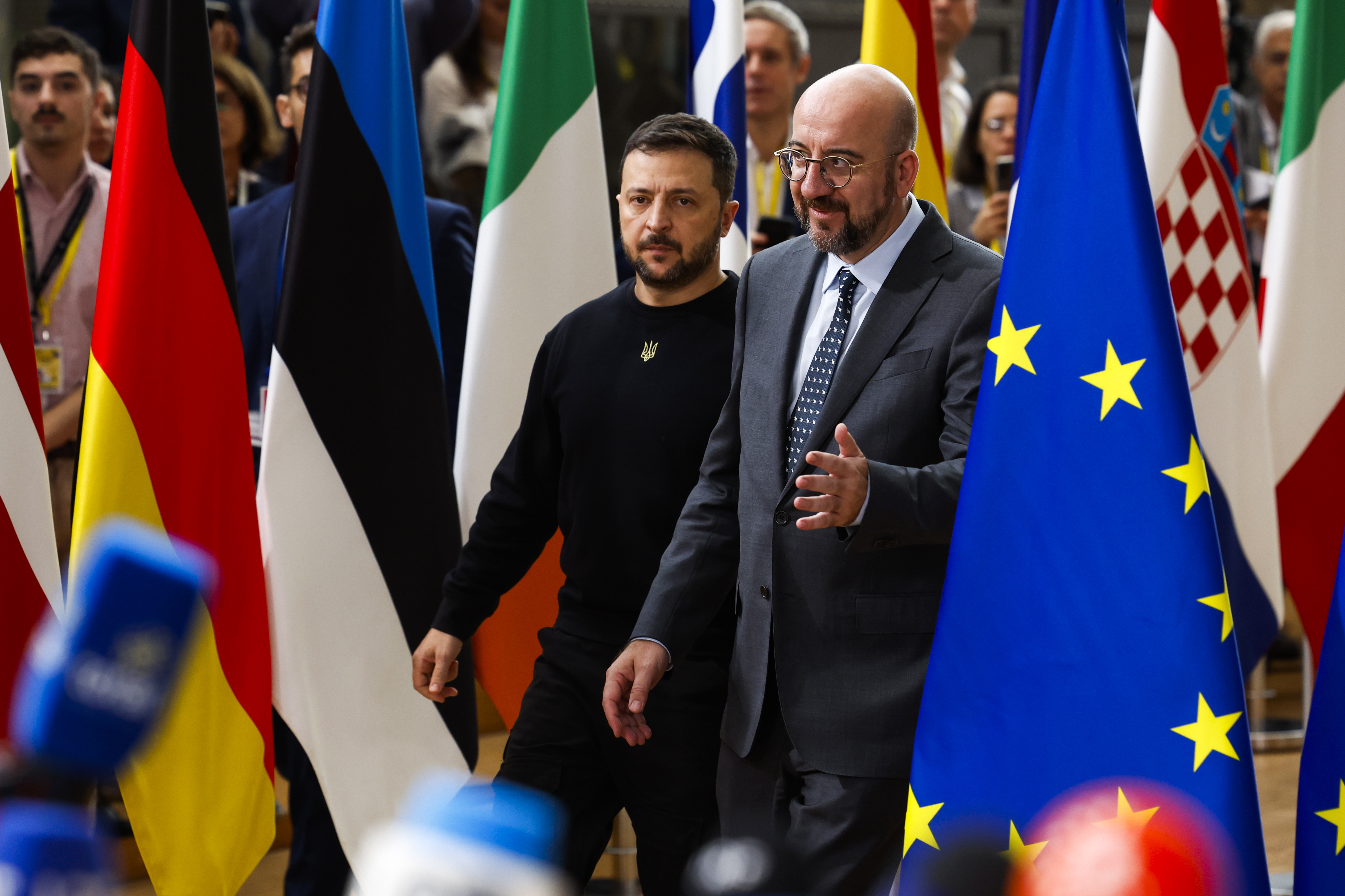 Ukraine's President Volodymyr Zelenskyy, left, and European Council President Charles Michel arrive to an EU summit in Brussels, Thursday, Oct. 17, 2024. (AP Photo/Geert Vanden Wijngaert)