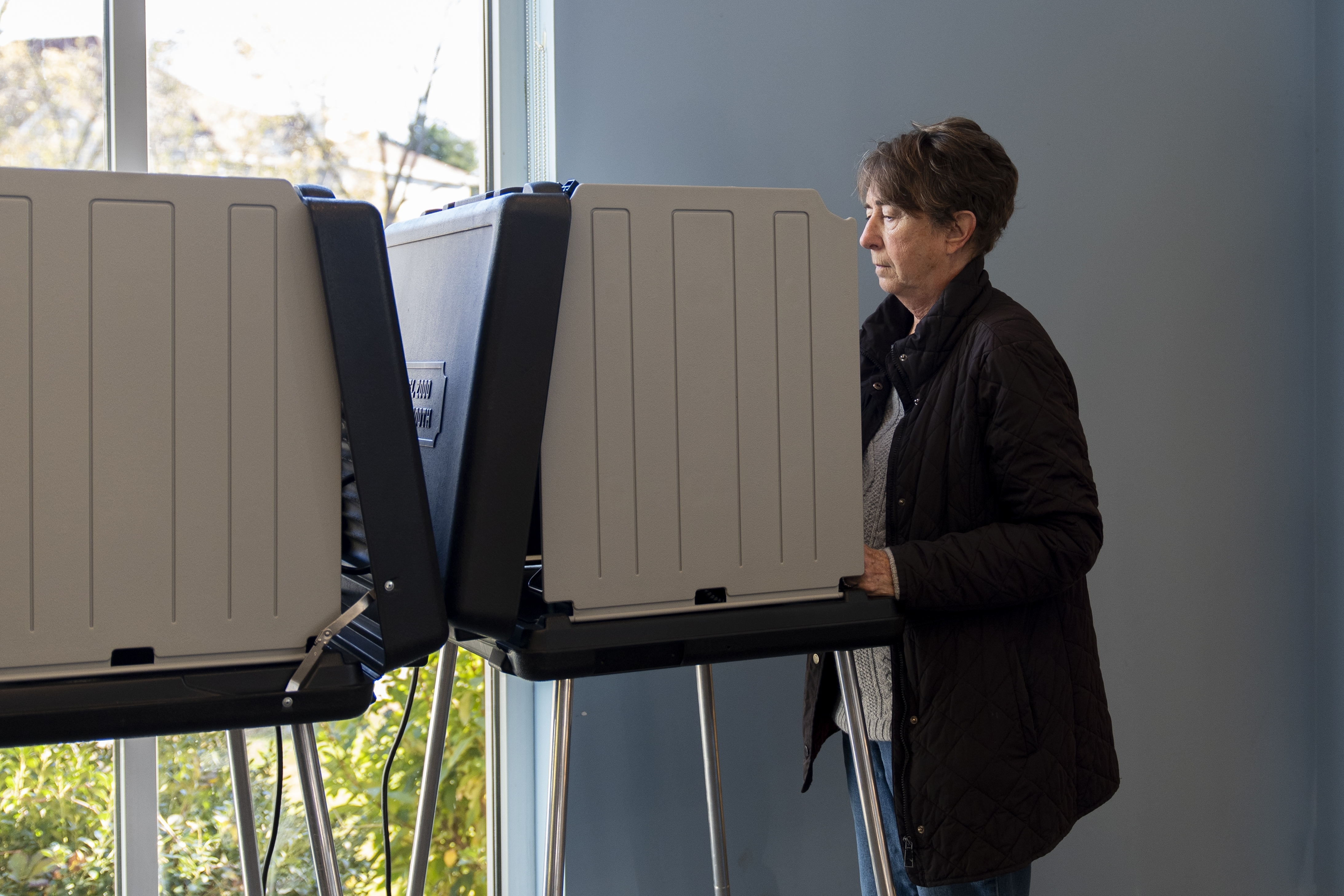 A voter marks their ballot during early in-person voting, Thursday, Oct. 17, 2024, in Asheville, N.C. (AP Photo/Stephanie Scarbrough)