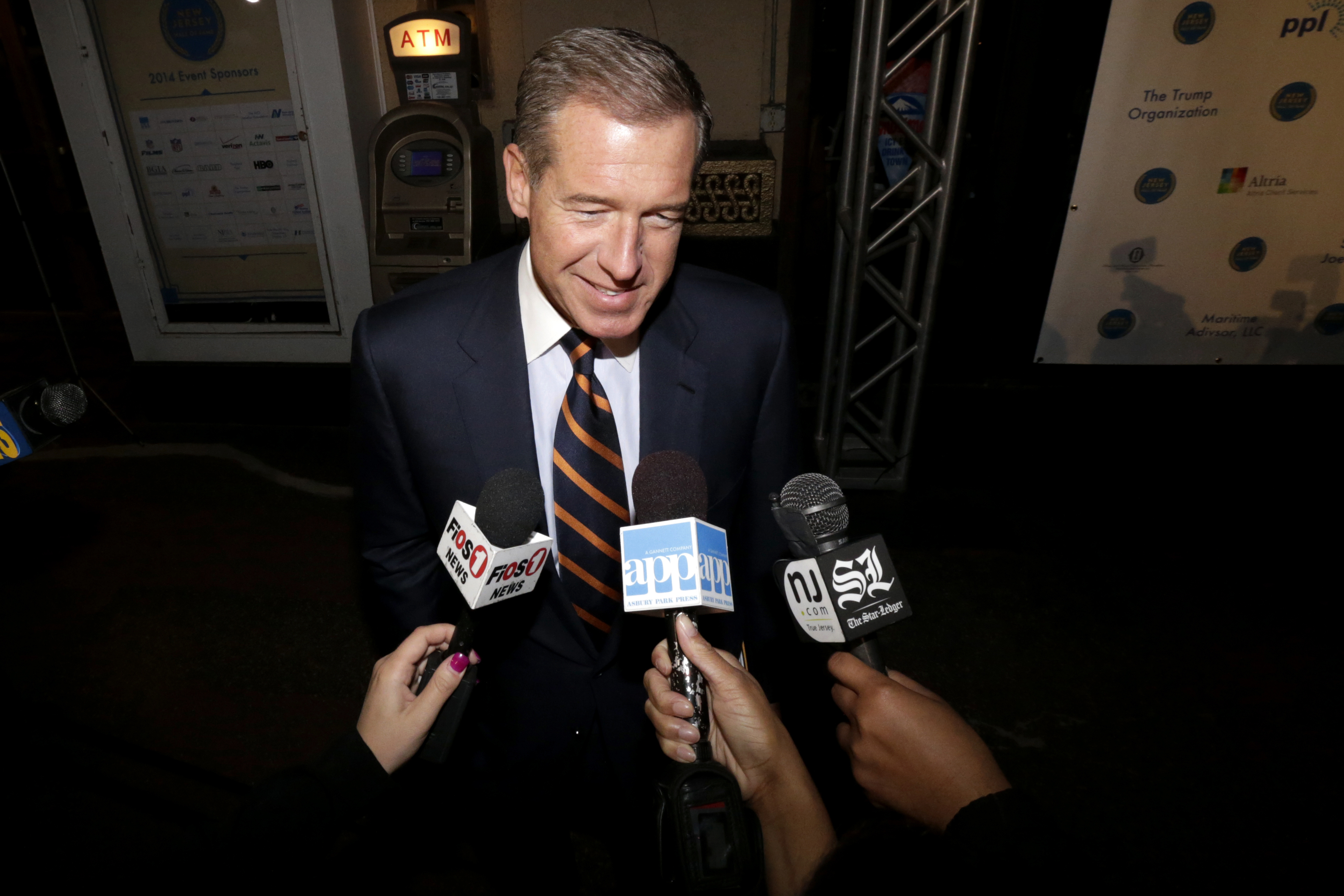 FILE - Television journalist Brian Williams arrives at the Asbury Park Convention Hall during red carpet arrivals prior to the New Jersey Hall of Fame inductions, in Asbury Park, N.J., Nov. 13, 2014. (AP Photo/Julio Cortez, File)