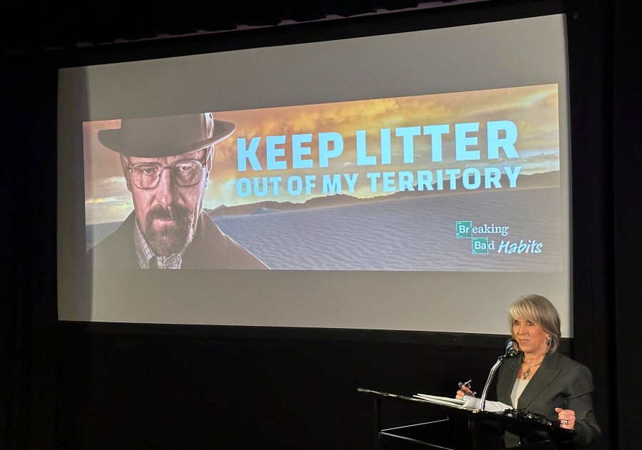 New Mexico Gov. Michelle Lujan Grisham introduces a public service ad campaign against littering that features "Breaking Bad" actor Bryan Cranston in a reprise of the series' character Walter White, on Thursday, Oct. 17, 2024, in Santa Fe, N.M.. (AP Photo/Morgan Lee)