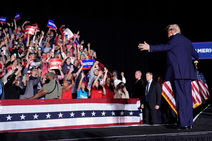 Republican presidential nominee former President Donald Trump arrives at a campaign rally, Friday, Oct. 18, 2024, in Detroit. (AP Photo/Evan Vucci)