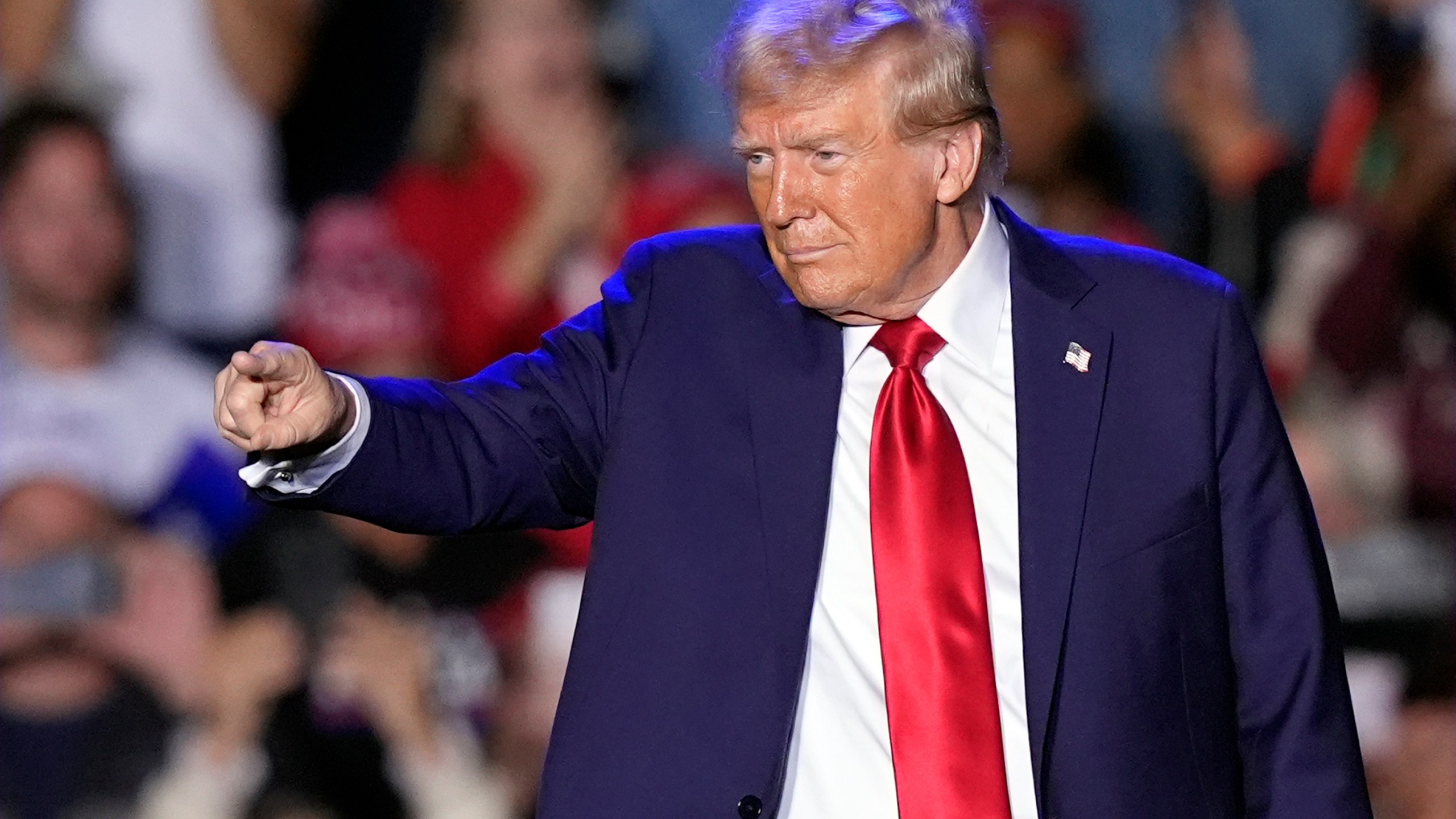 Republican presidential nominee former President Donald Trump gestures at a campaign event, Friday, Oct. 18, 2024, in Detroit. (AP Photo/Carlos Osorio)