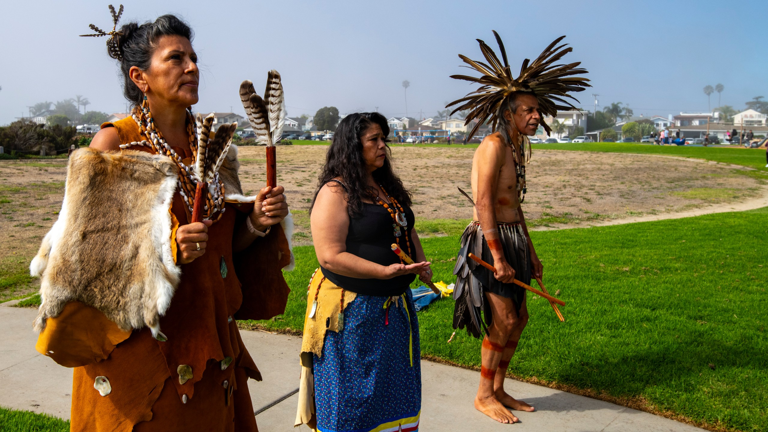 Dancers perform during celebration of "Indigenous Peoples' Day Picnic In The Park 2024" and Chumash Heritage National Marine Sanctuary at Dinosaur Caves Park, Pismo Beach on Monday, October. 14, 2024. (Robert Schwemmer via AP)