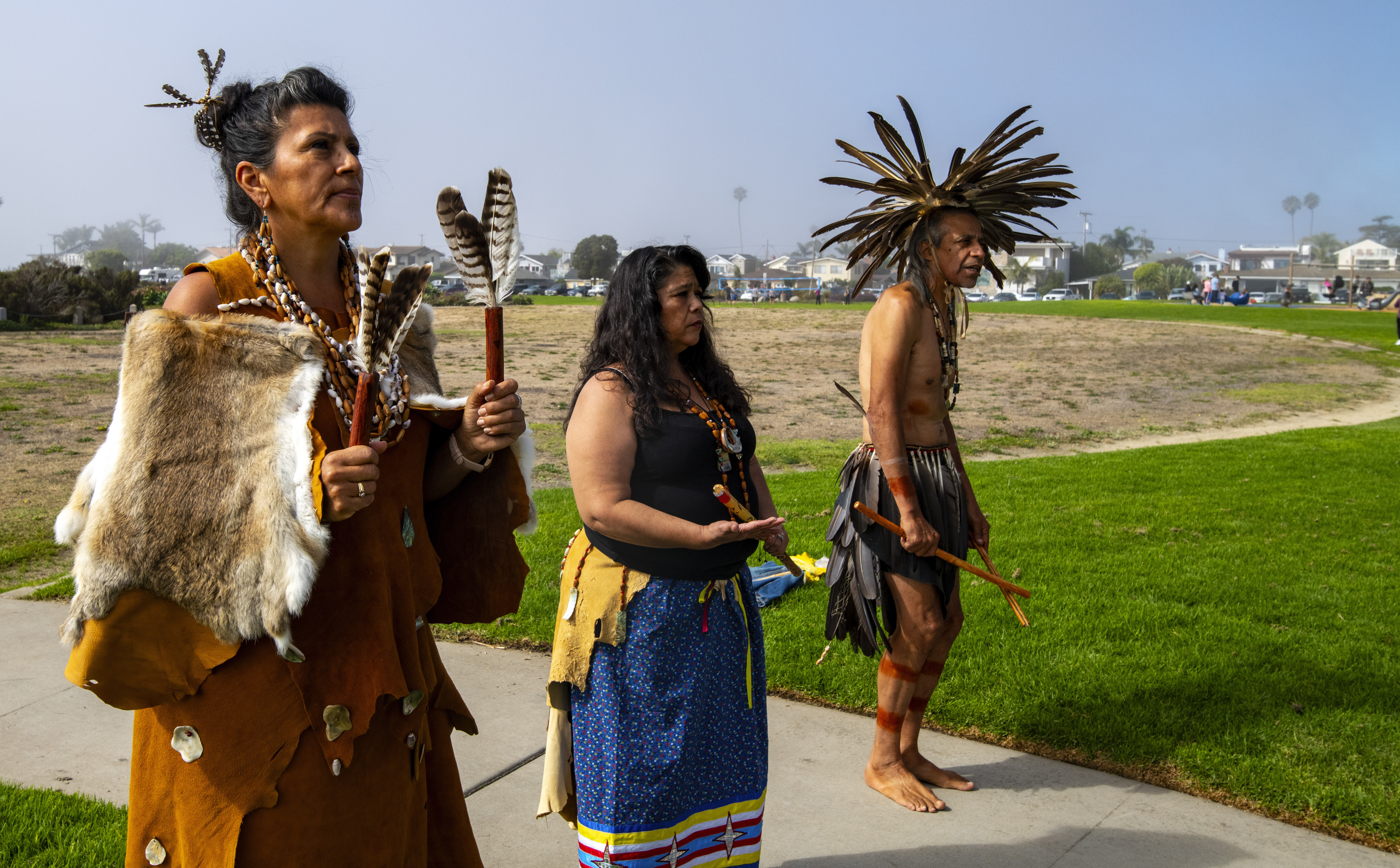 Dancers perform during celebration of "Indigenous Peoples' Day Picnic In The Park 2024" and Chumash Heritage National Marine Sanctuary at Dinosaur Caves Park, Pismo Beach on Monday, October. 14, 2024. (Robert Schwemmer via AP)