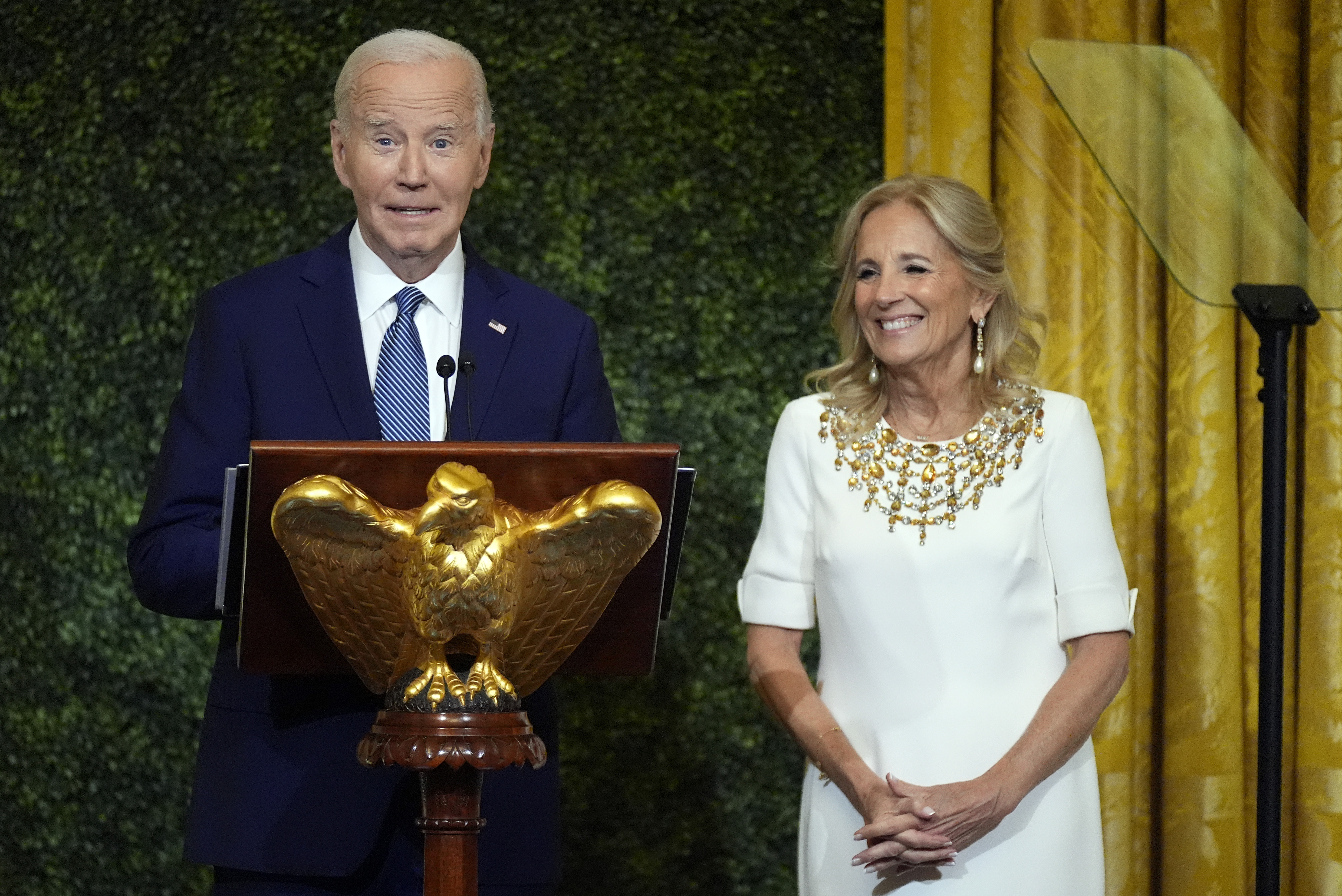 President Joe Biden and first lady Jill Biden speak at a dinner Sunday, Oct. 20, 2024, in the East Room of the White House, celebrating the new enhanced and expanded White House Public tour being unveiled by first lady Jill Biden on Oct. 21, 2024. (AP Photo/Manuel Balce Ceneta)