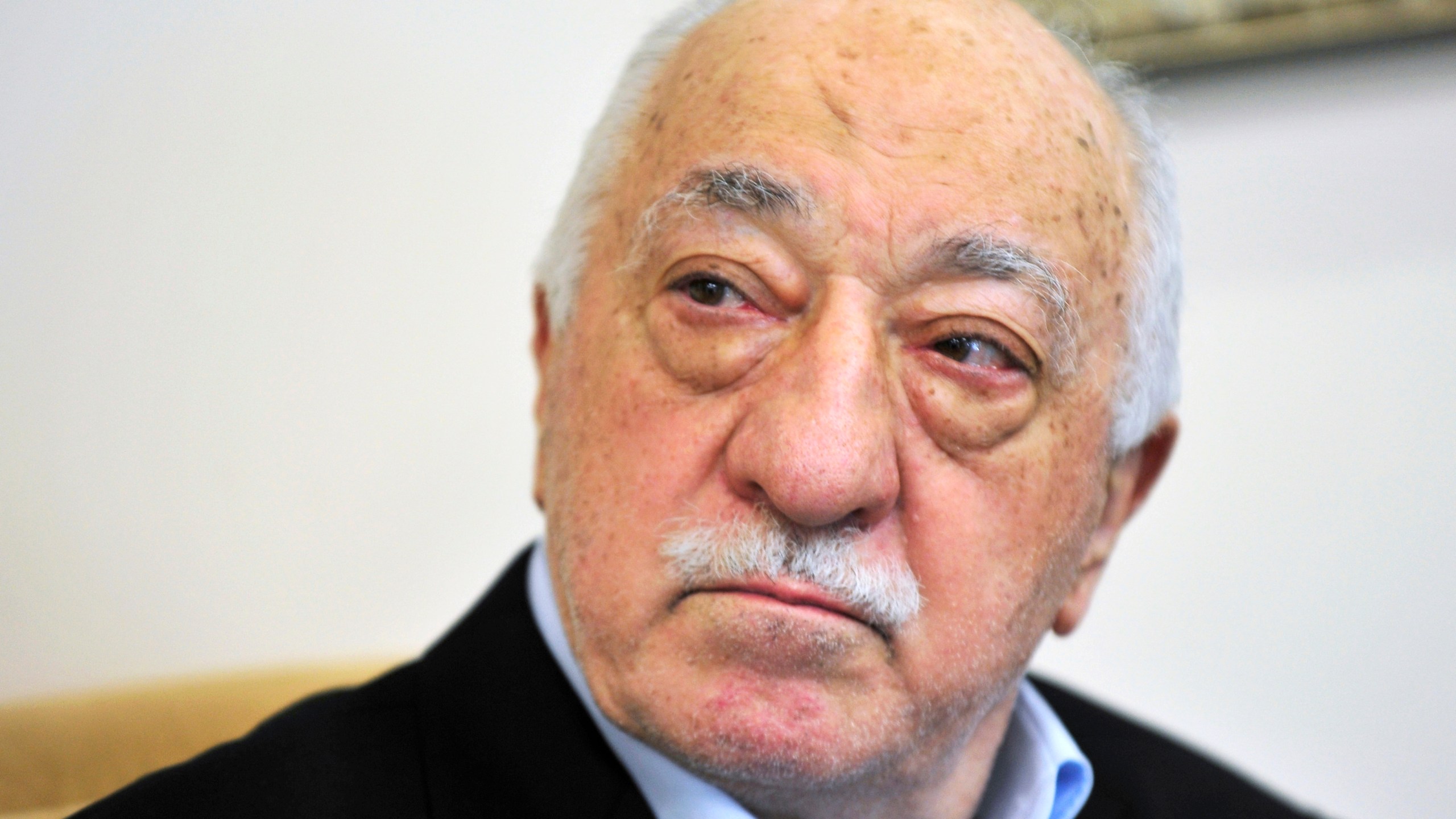 FILE - Turkish Islamic cleric Fethullah Gulen speaks to members of the media at his compound in Saylorsburg, Pa. in July 2016. (AP Photo/Chris Post, File)