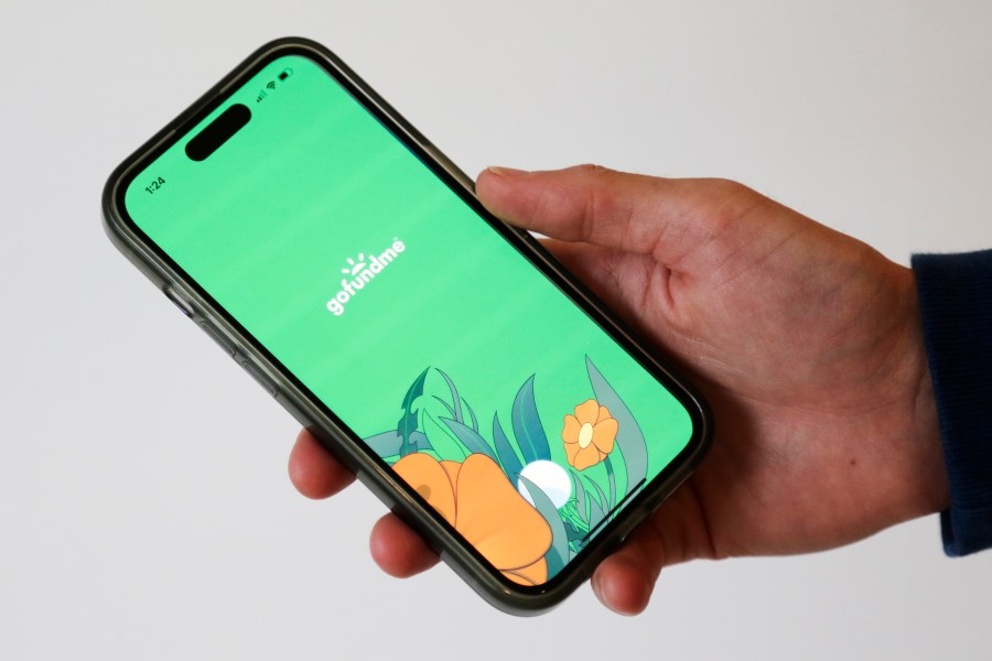 The home page for the crowdfunding platform GoFundMe is shown on a device on Wednesday, Oct. 16, 2024 in New York. (AP Photo/Peter Morgan)