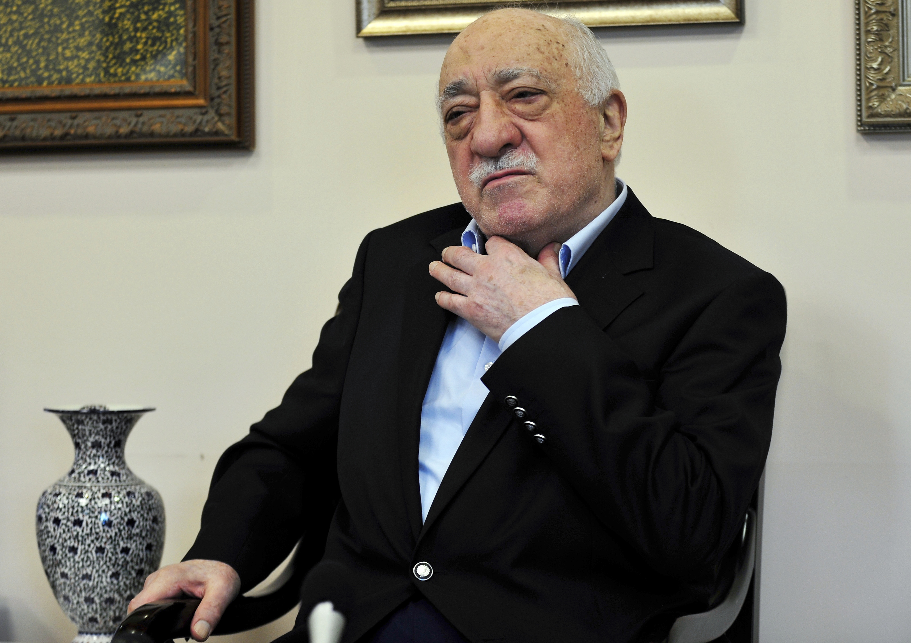 FILE - Turkish Islamic cleric Fethullah Gulen meets members of the media at his compound in Saylorsburg, Pa. in July 2016. (AP Photo/Chris Post, File)