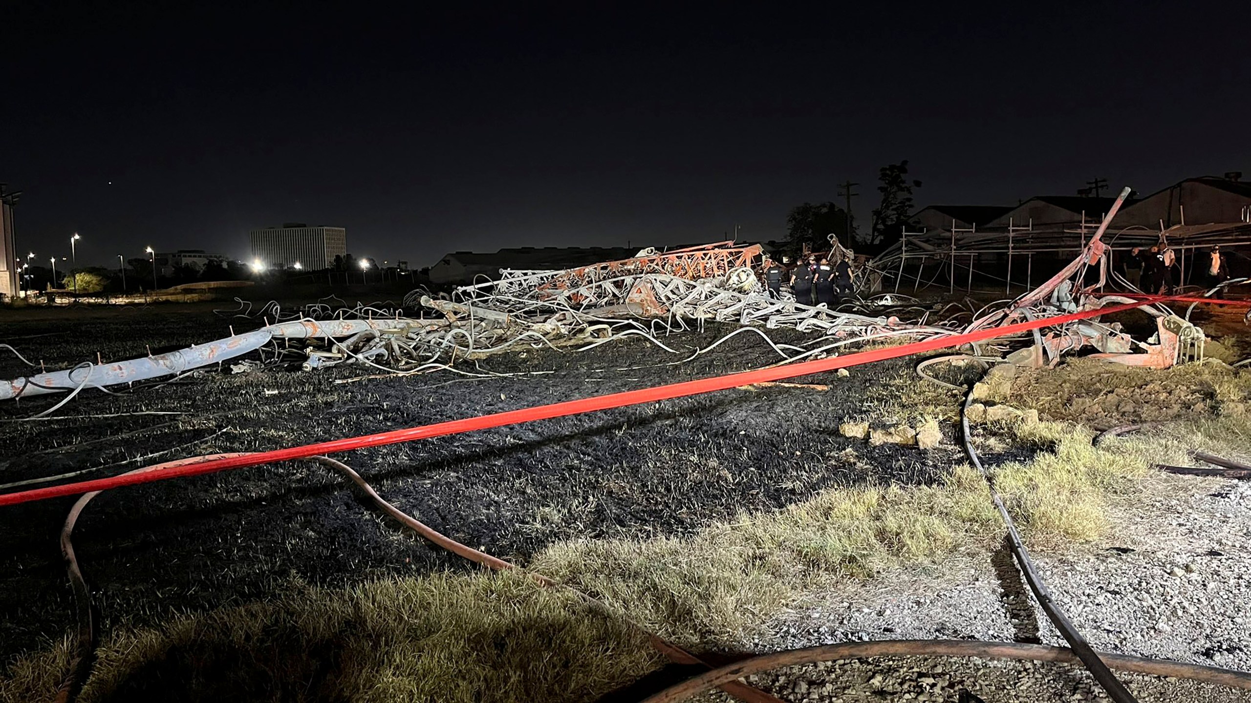 This image provided by the Houston Fire Department shows the scene of a helicopter crash in the city's Second Ward, Sunday, Oct. 20, 2024. (Houston Fire Department via AP)