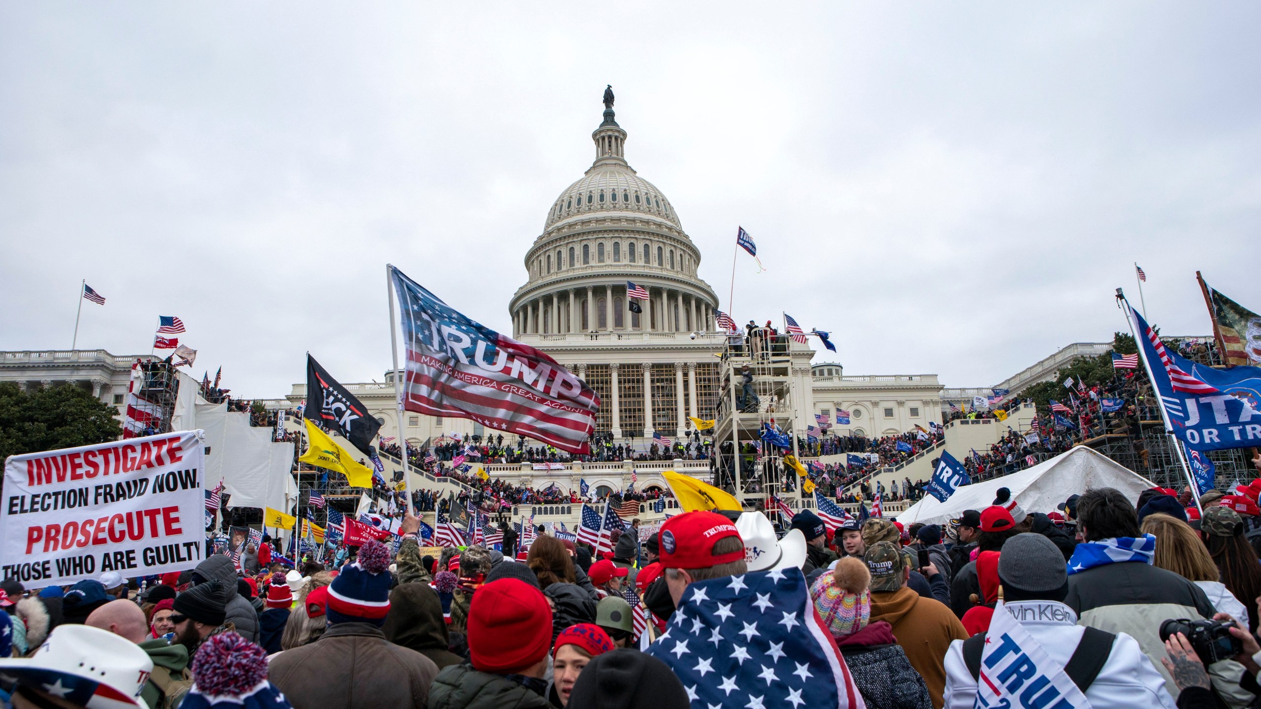 FILE - People attack the U.S. Capitol in Washington, on Jan. 6, 2021. (AP Photo/Jose Luis Magana, File)