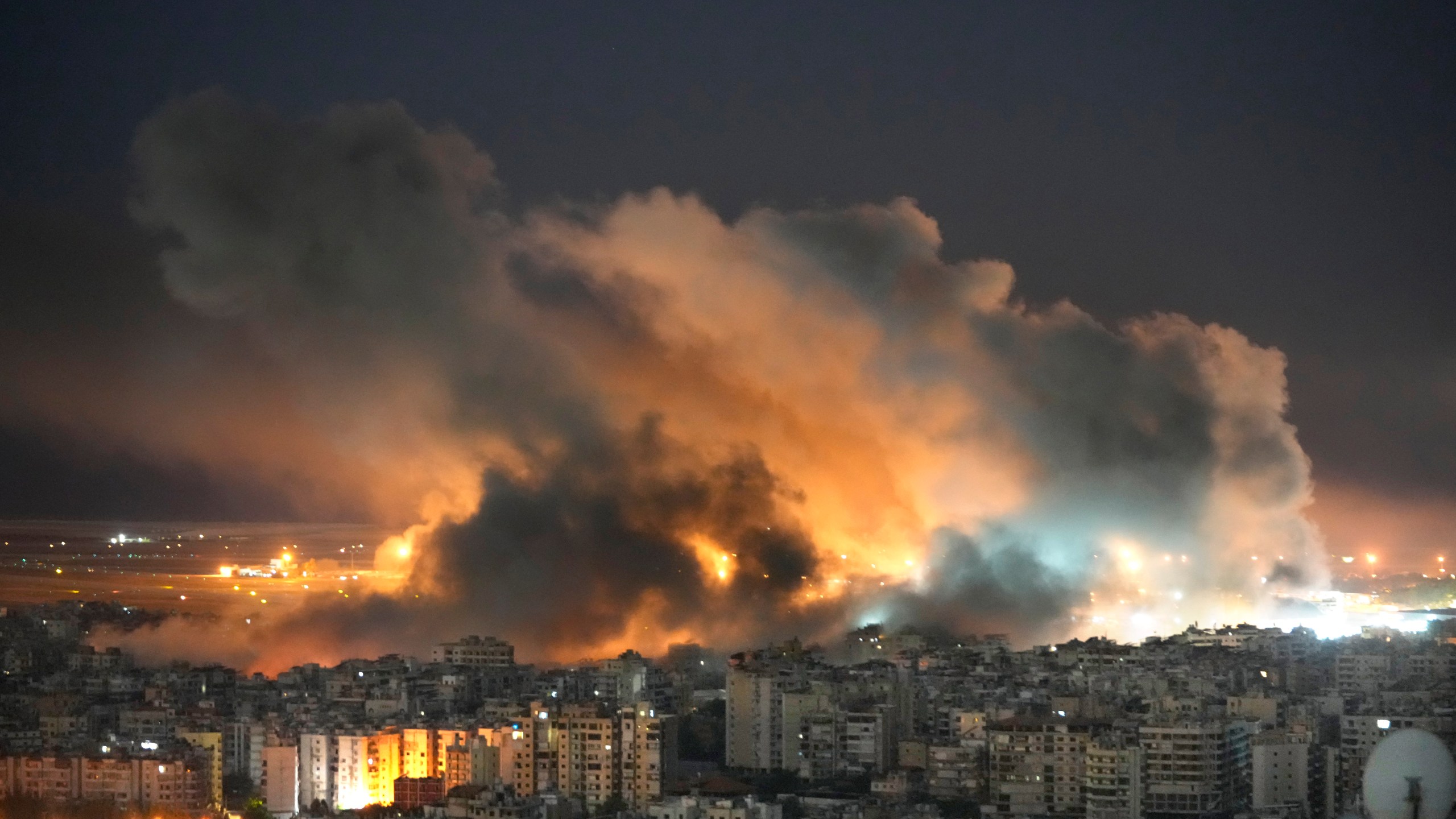 Flames and smoke rise form Israeli airstrikes on Dahiyeh, in the southern suburb of Beirut, Lebanon, Sunday, Oct. 20, 2024. (AP Photo/Hussein Malla)