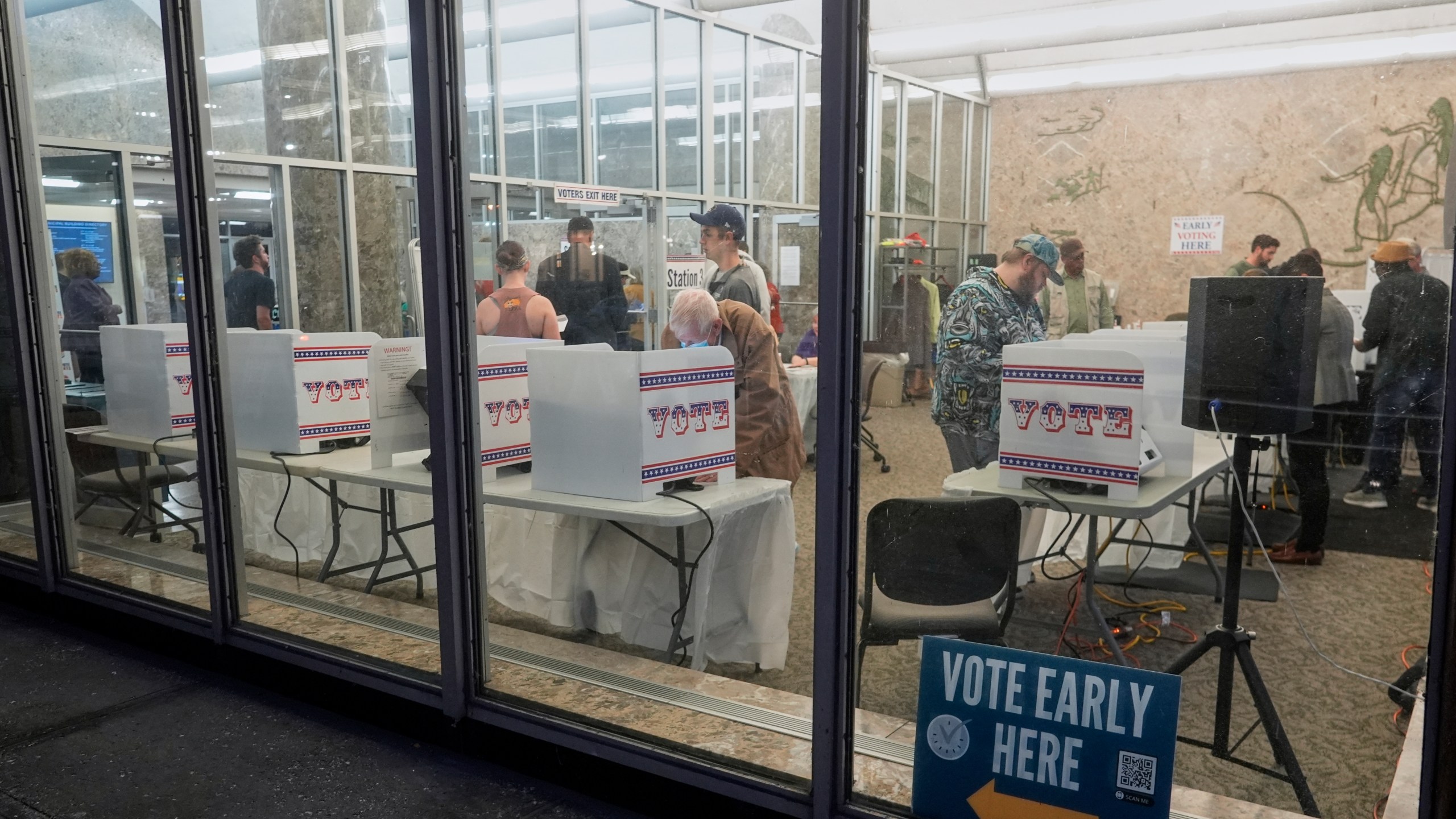 Voters cast their ballots at the Frank P. Zeidler Municipal Building during the first day of Wisconsin's in-person absentee voting Tuesday, Oct. 22, 2024, in Milwaukee. (AP Photo/Morry Gash)