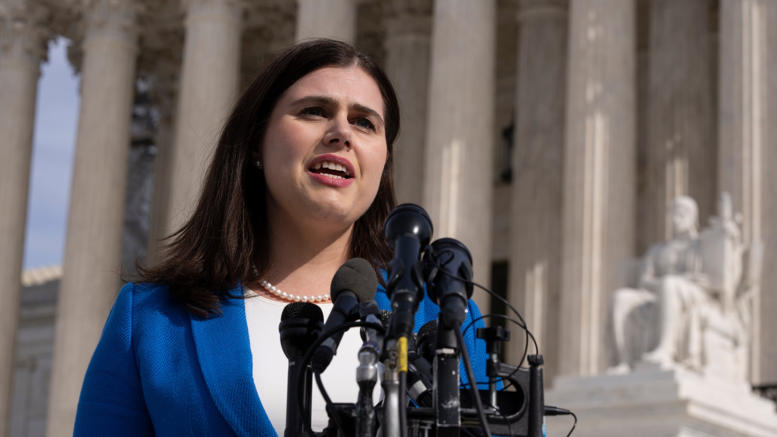 FILE - Colorado Secretary of State Jena Griswold speaks in front of the U.S. Supreme Court, Feb. 8, 2024, in Washington. (AP Photo/Manuel Balce Ceneta, File)