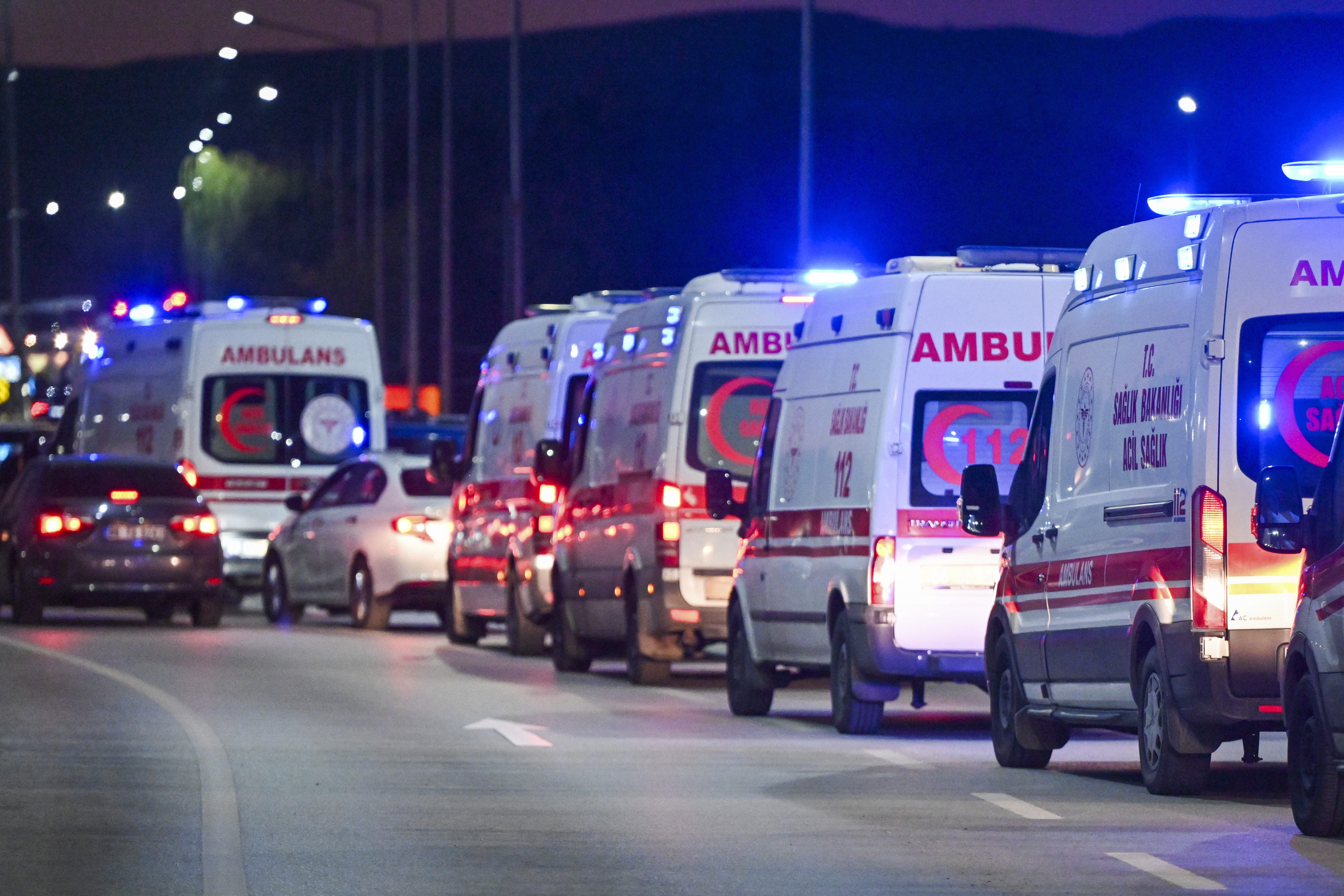 Ambulances wait in line outside of Turkish Aerospace Industries Inc. at the outskirts of Ankara, Turkey, Wednesday, Oct. 23, 2024. (AP Photo)