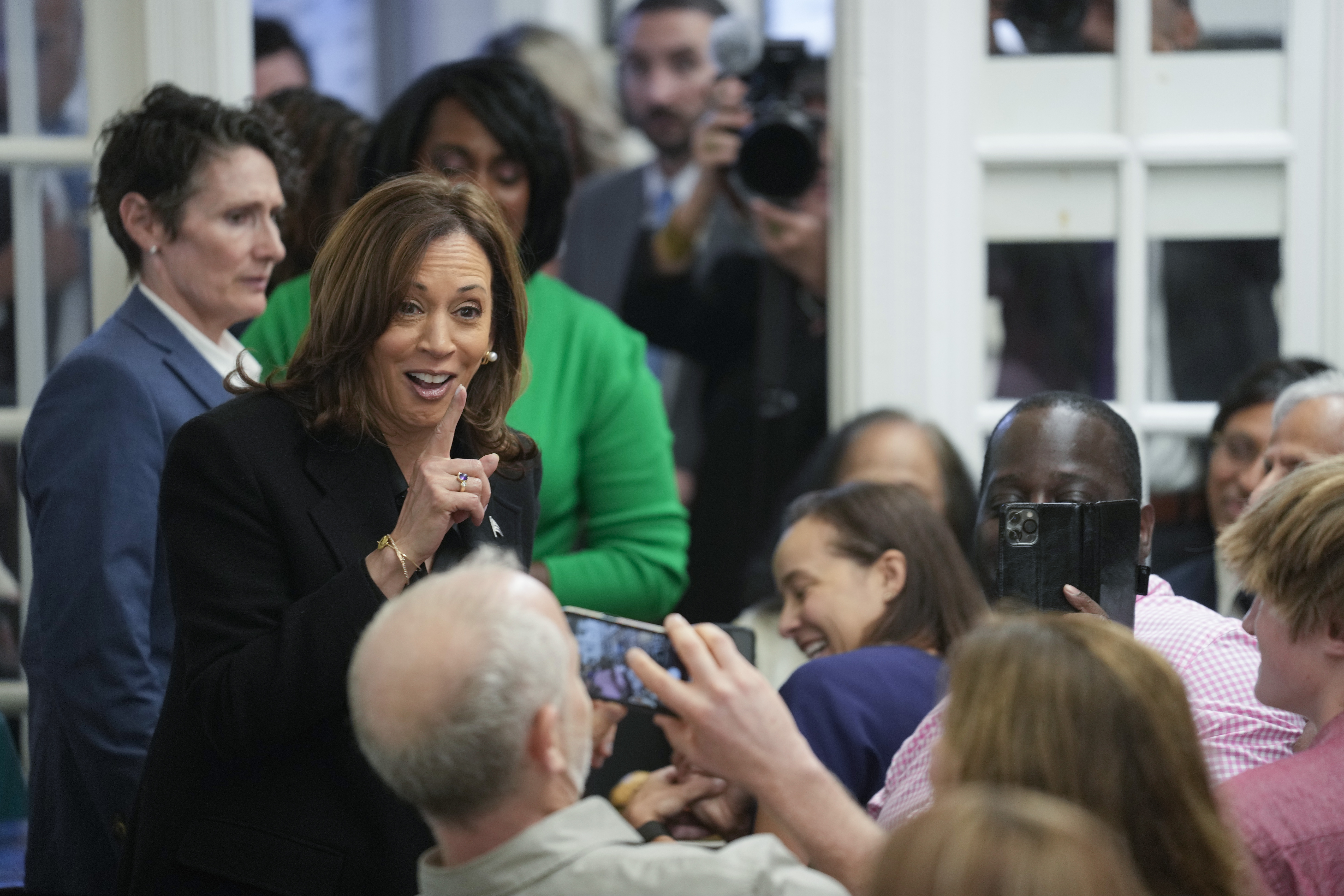 Democratic presidential nominee Vice President Kamala Harris speaks to patrons at a campaign stop at Famous 4th Street Delicatessen in Philadelphia, Wednesday, Oct. 23, 2024. (AP Photo/Matt Rourke)