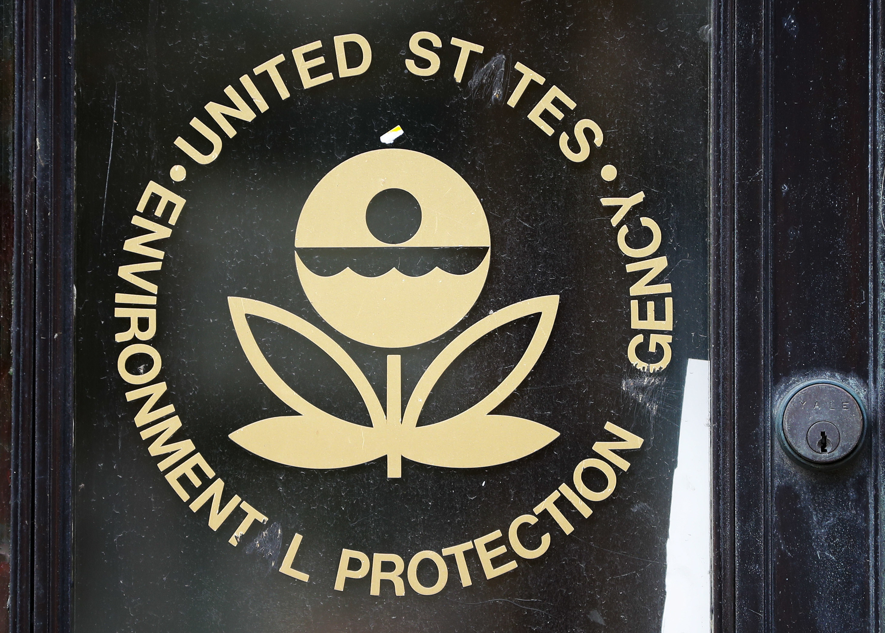 FILE - The logo for the EPA with the letters 'A' scratched out at the Environmental Protection Agency Building in Washington, Sept. 21, 2017. (AP Photo/Pablo Martinez Monsivais, File)