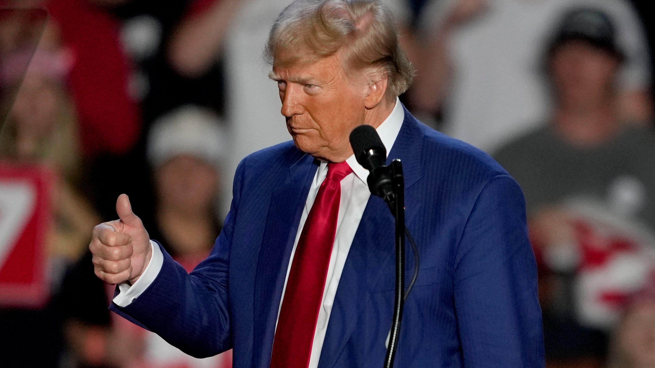 Republican presidential nominee former President Donald Trump gives a thumbs up as he speaks at a campaign event at Mullett Arena, Thursday, Oct. 24, 2024, in Tempe, Ariz. (AP Photo/Matt York)