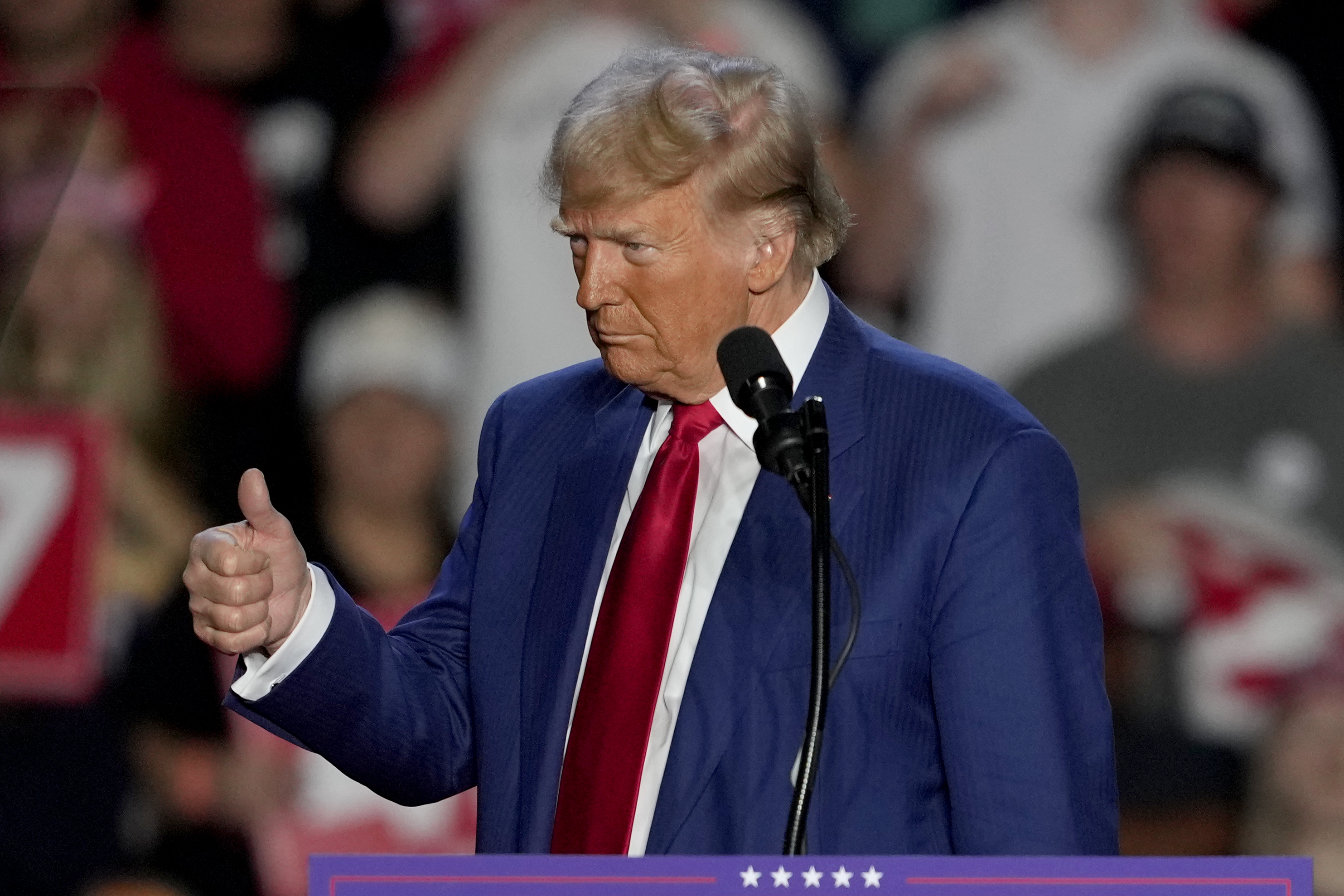 Republican presidential nominee former President Donald Trump gives a thumbs up as he speaks at a campaign event at Mullett Arena, Thursday, Oct. 24, 2024, in Tempe, Ariz. (AP Photo/Matt York)