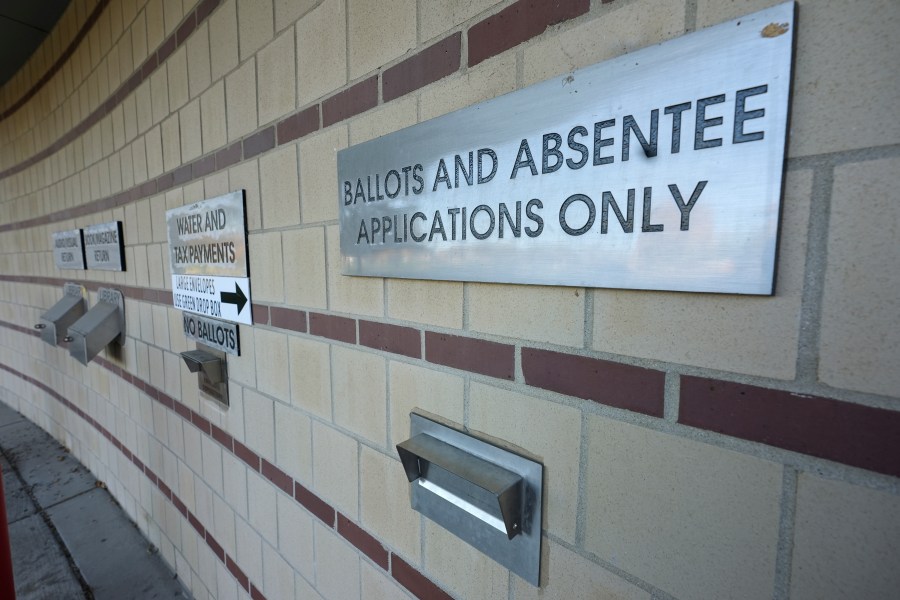 A drop slot for voting ballots and absentee applications is shown outside of the Warren City Hall complex Thursday, Oct. 24, 2024, in Warren, Mich. (AP Photo/Paul Sancya)