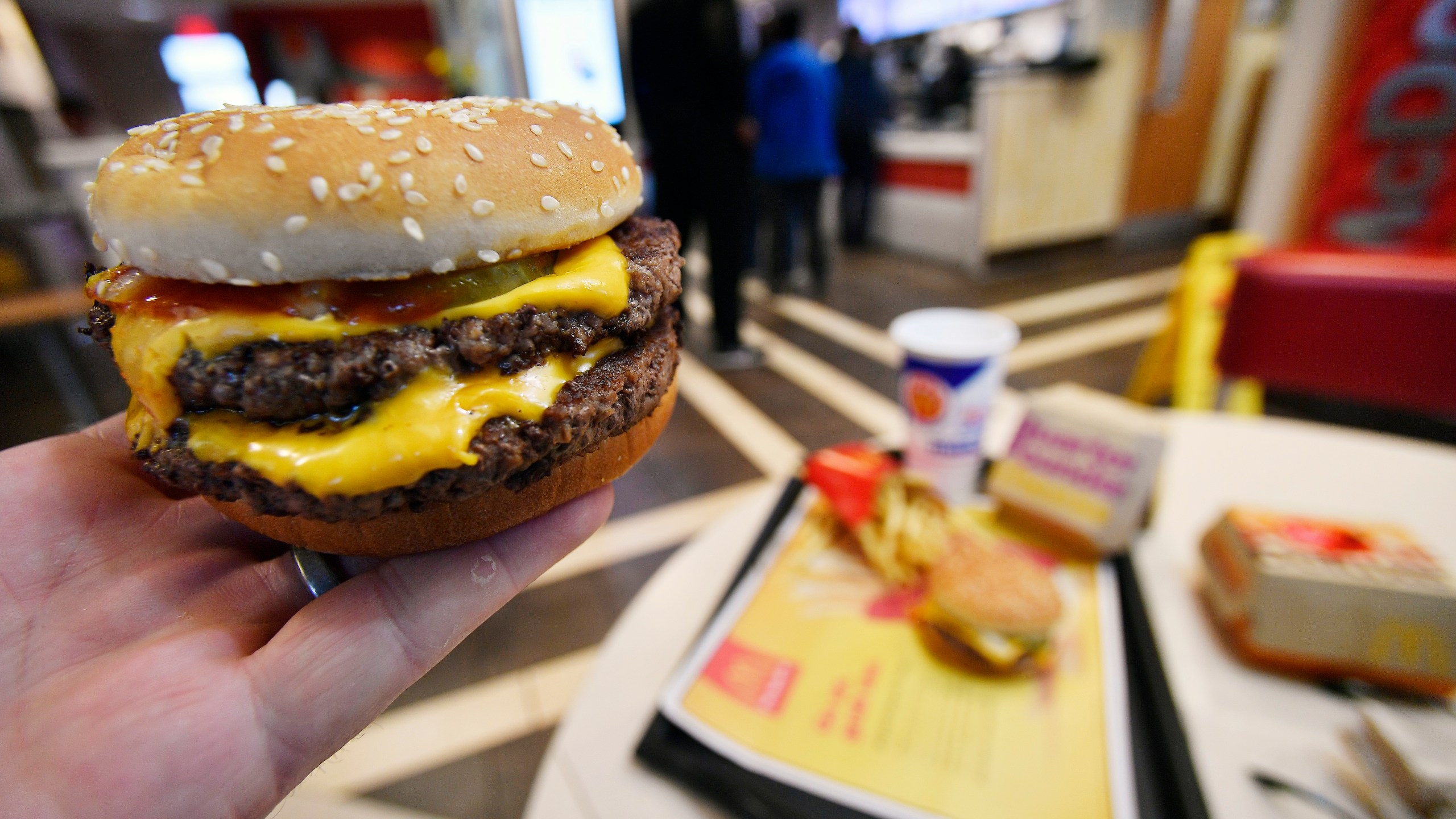 FILE - A McDonald's Double Quarter Pounder is shown on March 6, 2018, in Atlanta. (AP Photo/Mike Stewart, File)