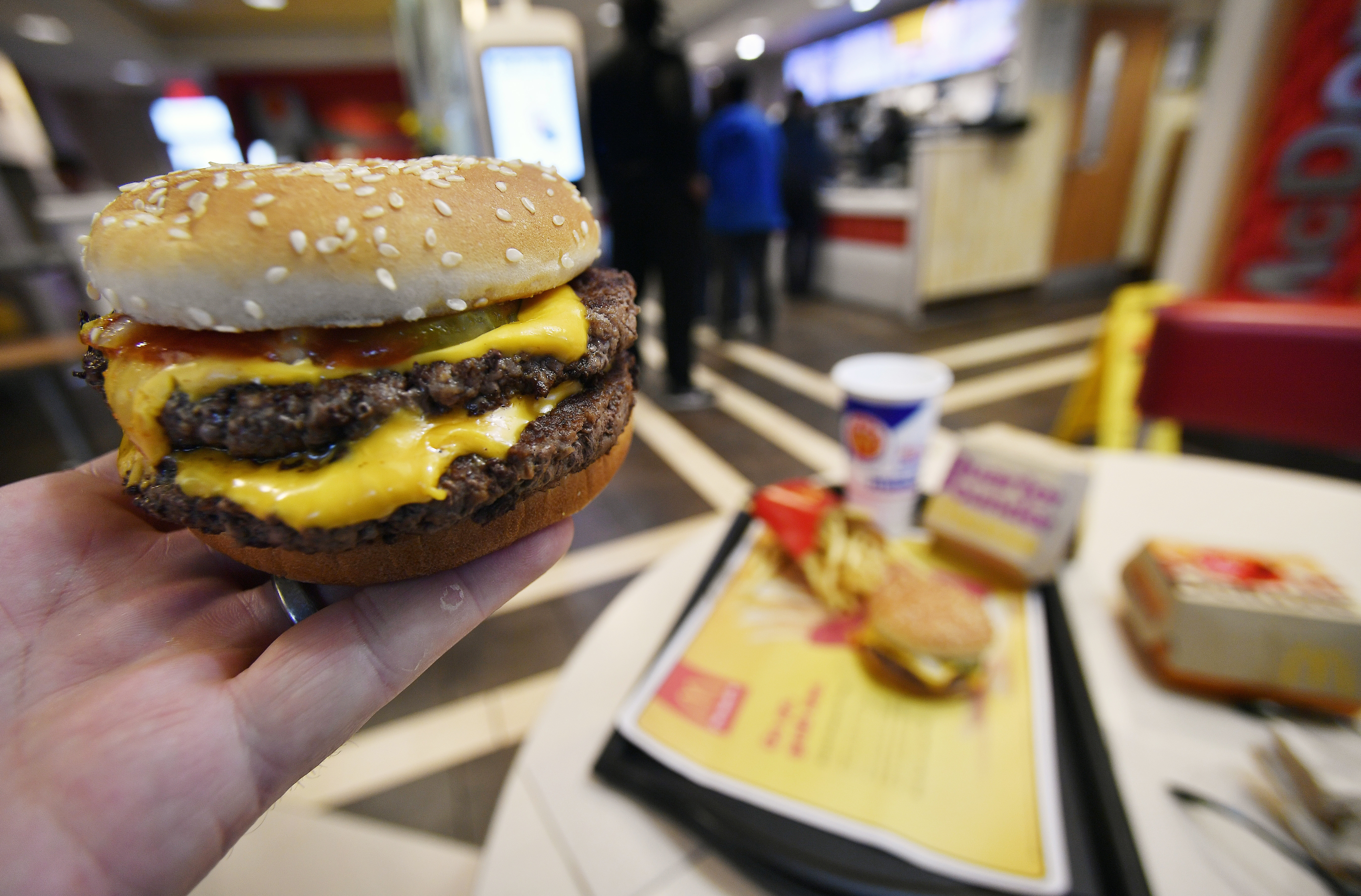 FILE - A McDonald's Double Quarter Pounder is shown on March 6, 2018, in Atlanta. (AP Photo/Mike Stewart, File)