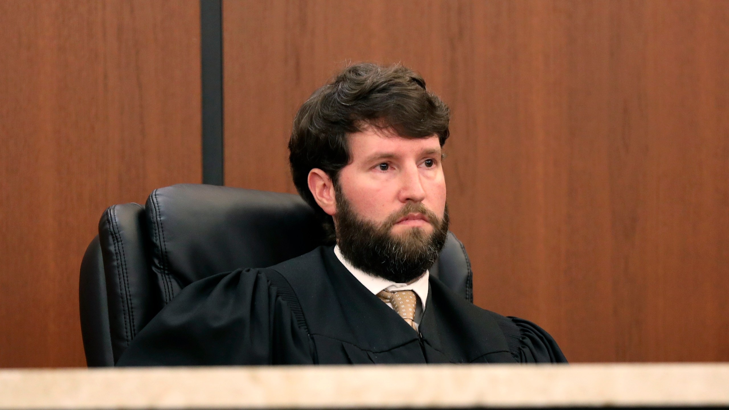 South Carolina Judge Daniel Coble listens to arguments regarding reopening voter registration to allow teens to vote after a glitch in the DMV's computers on Friday, Oct. 25, 2024, in Columbia, S.C. (AP Photo/Jeffrey Collins)