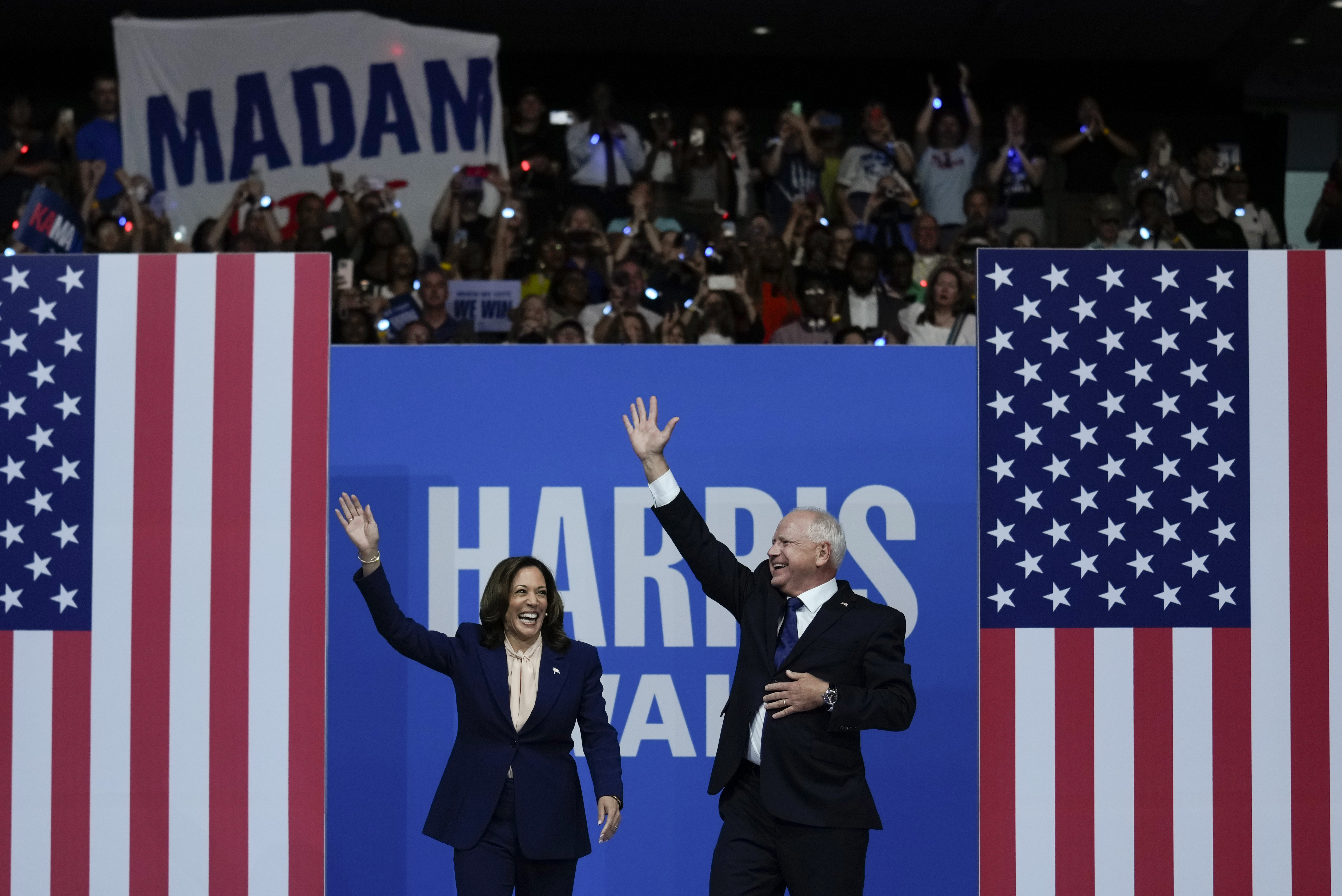 FILE - Democratic presidential nominee Vice President Kamala Harris and her running mate Minnesota Gov. Tim Walz arrive at a campaign rally in Philadelphia, Tuesday, Aug. 6, 2024. (AP Photo/Matt Rourke, File)