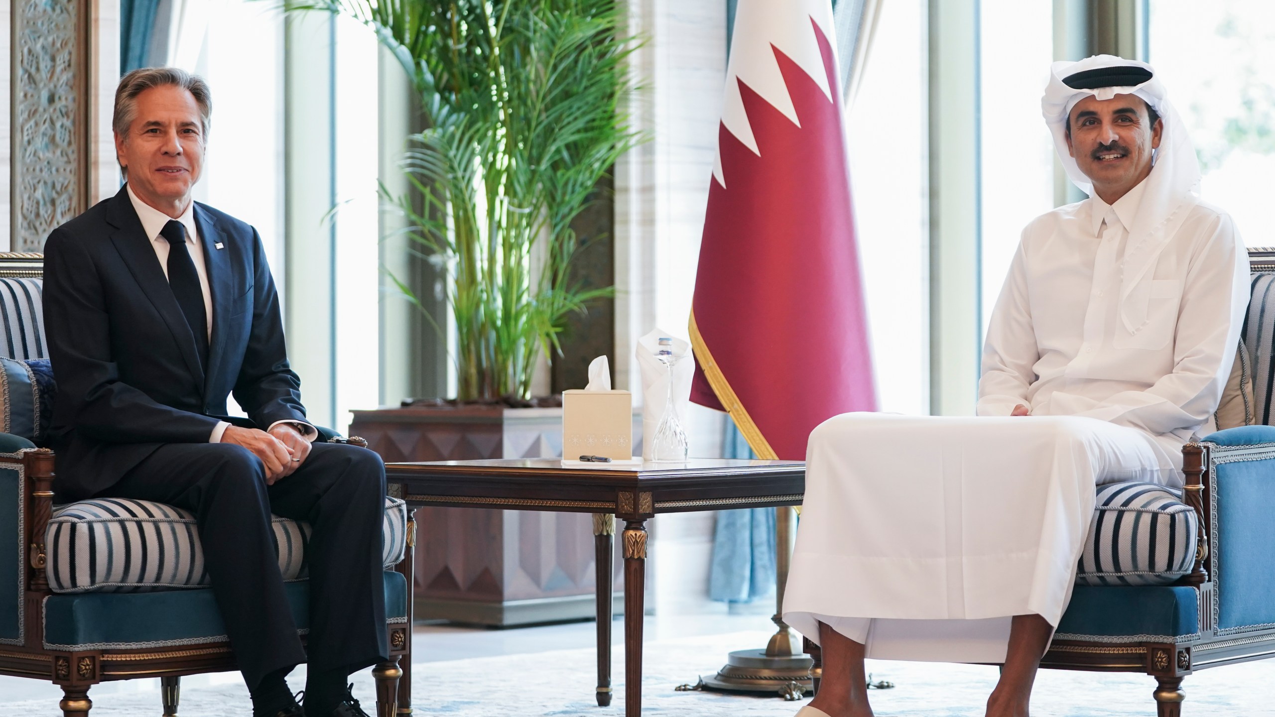 U.S. Secretary of State Antony Blinken, left, meets with Qatar's Emir Sheikh Tamim bin Hamad al-Thani in Doha, Qatar, Thursday, Oct. 24, 2024. (Nathan Howard/Pool Photo via AP)