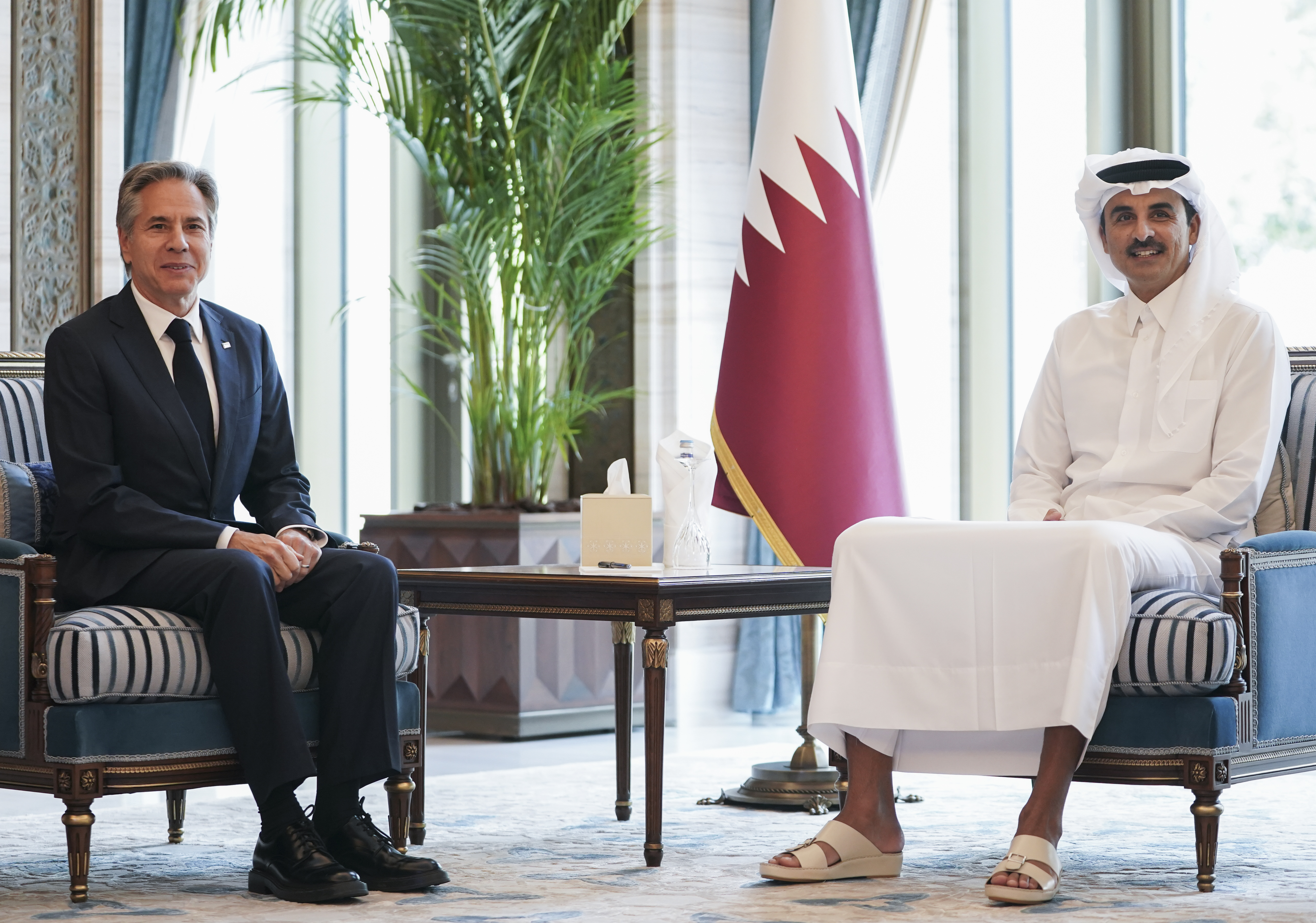 U.S. Secretary of State Antony Blinken, left, meets with Qatar's Emir Sheikh Tamim bin Hamad al-Thani in Doha, Qatar, Thursday, Oct. 24, 2024. (Nathan Howard/Pool Photo via AP)