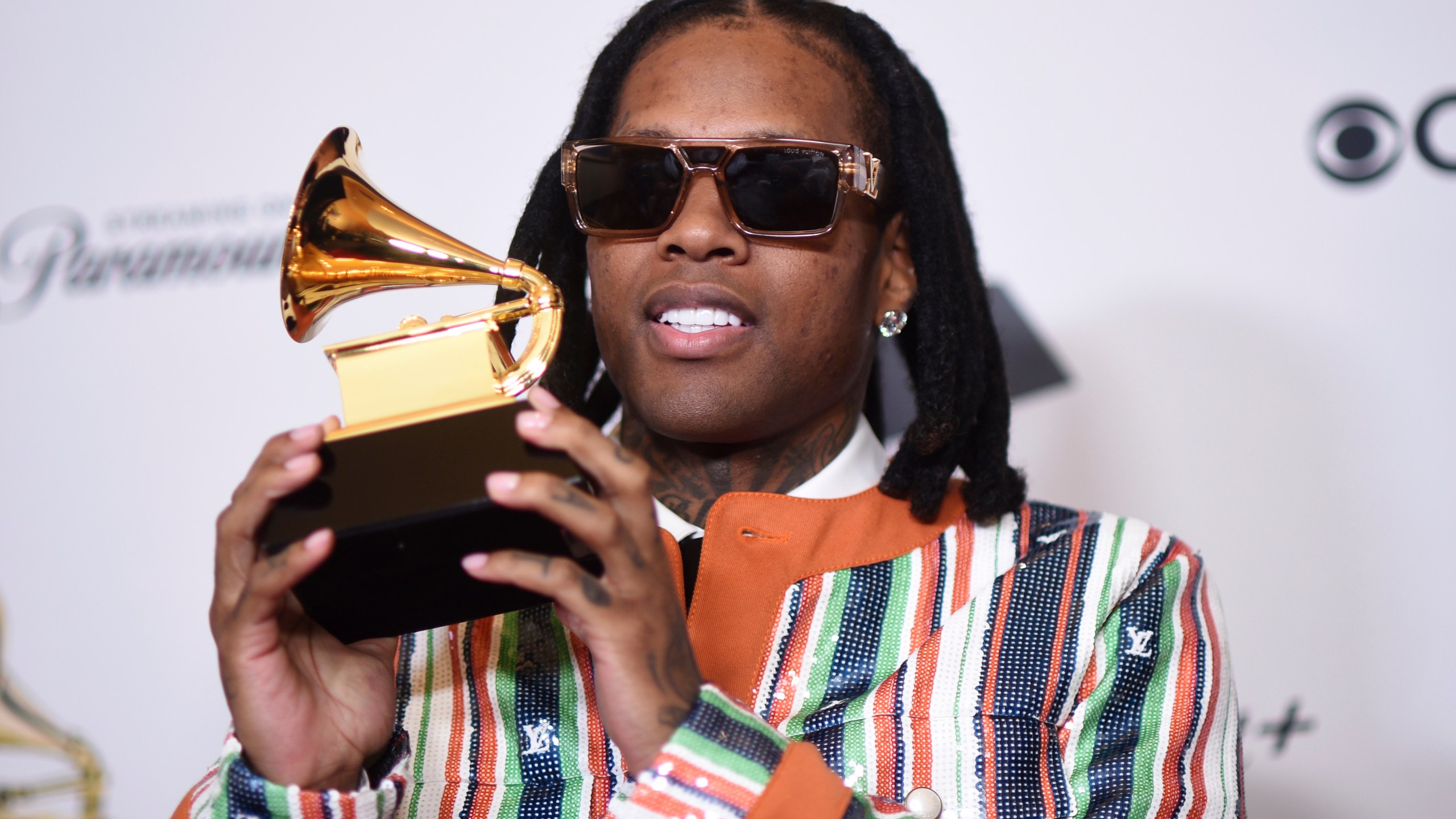 FILE - Lil Durk poses in the press room with the award for best melodic rap performance for "All My Life" by Lil Durk featuring J. Cole during the 66th annual Grammy Awards, Feb. 4, 2024, in Los Angeles. (Photo by Richard Shotwell/Invision/AP, File)