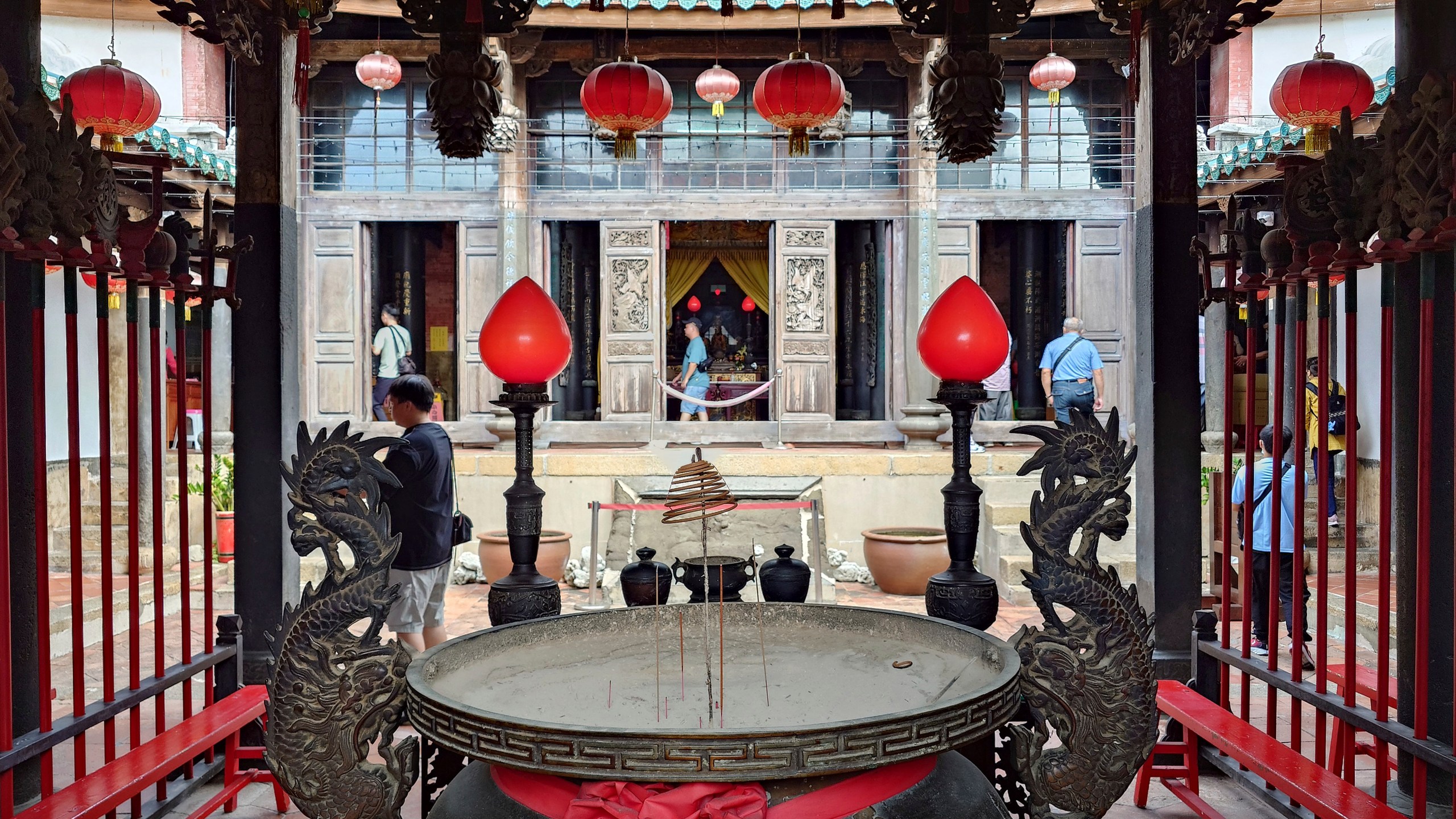 People visit the historic Penghu Tianhou Temple on the outlying Penghu Island, Taiwan, Friday, Oct. 25, 2024. (AP Photo/Chiang Ying-ying)