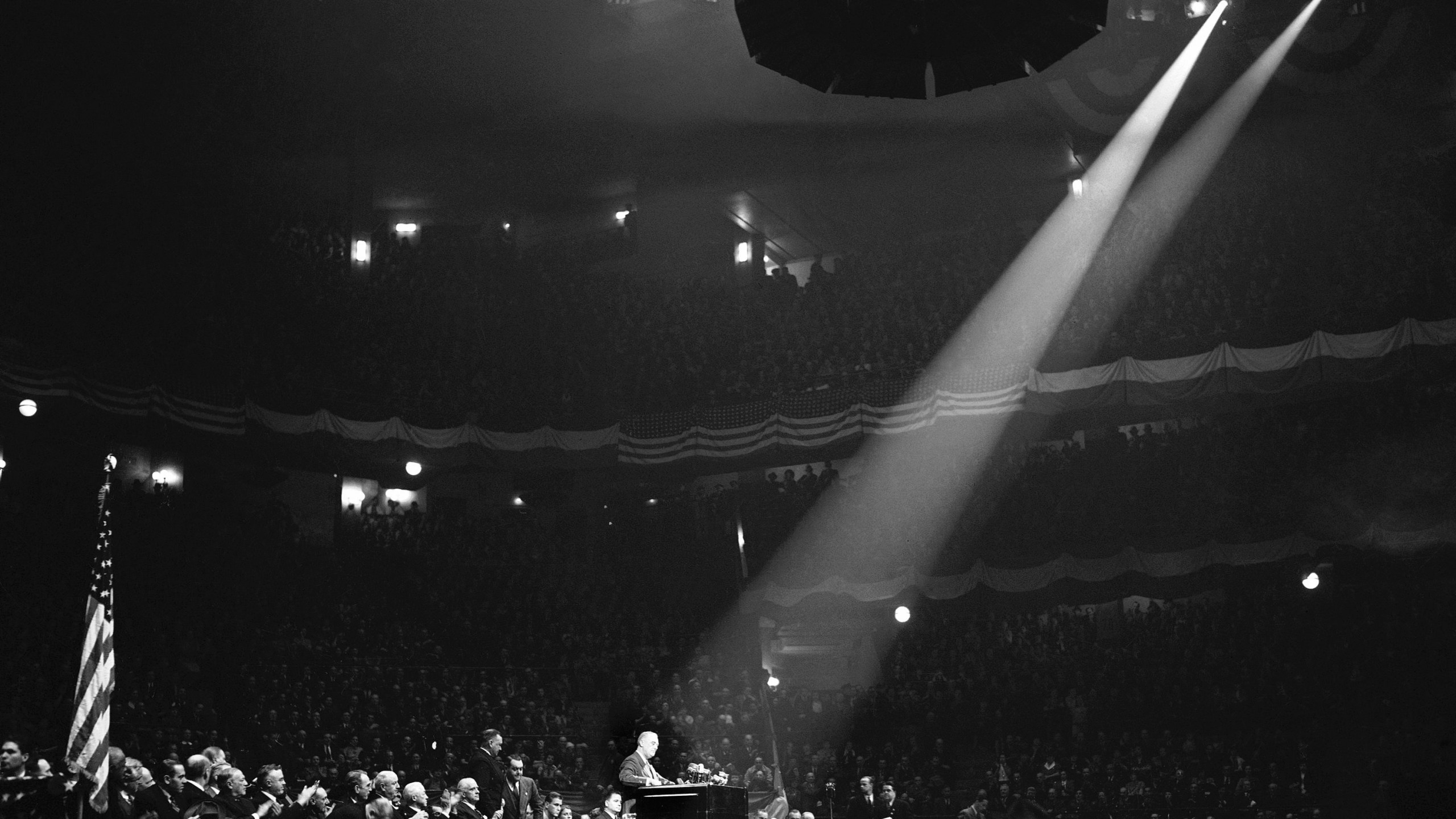 FILE - This is part of the crowd which packed New York City's Madison Square Garden on Oct. 28, 1940 to hear President Franklin Roosevelt charge in a campaign speech that the "responsible leadership of the republican party" had tried to "sabotage" increased defense appropriations and block aid to Britain prior to the present election campaign. (AP Photo/Harry Harris, File)