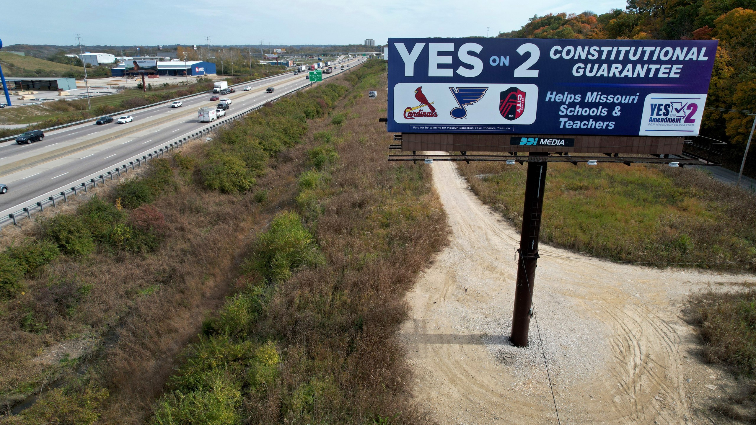 A billboard promoting a ballot measure to legalize sports betting in Missouri is seen along Interstate 44 Wednesday, Oct. 23, 2024, in St. Louis County, Mo. (AP Photo/Jeff Roberson)