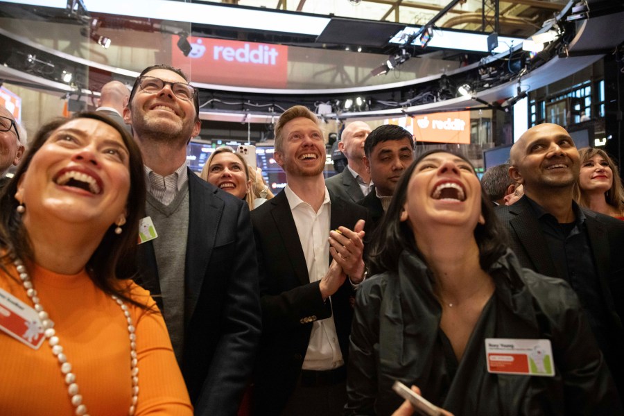 FILE - Reddit CEO Steve Huffman and company employees celebrate on the New York Stock Exchange trading floor, prior to his company's IPO, March. 21, 2024. (AP Photo/Yuki Iwamura, File)