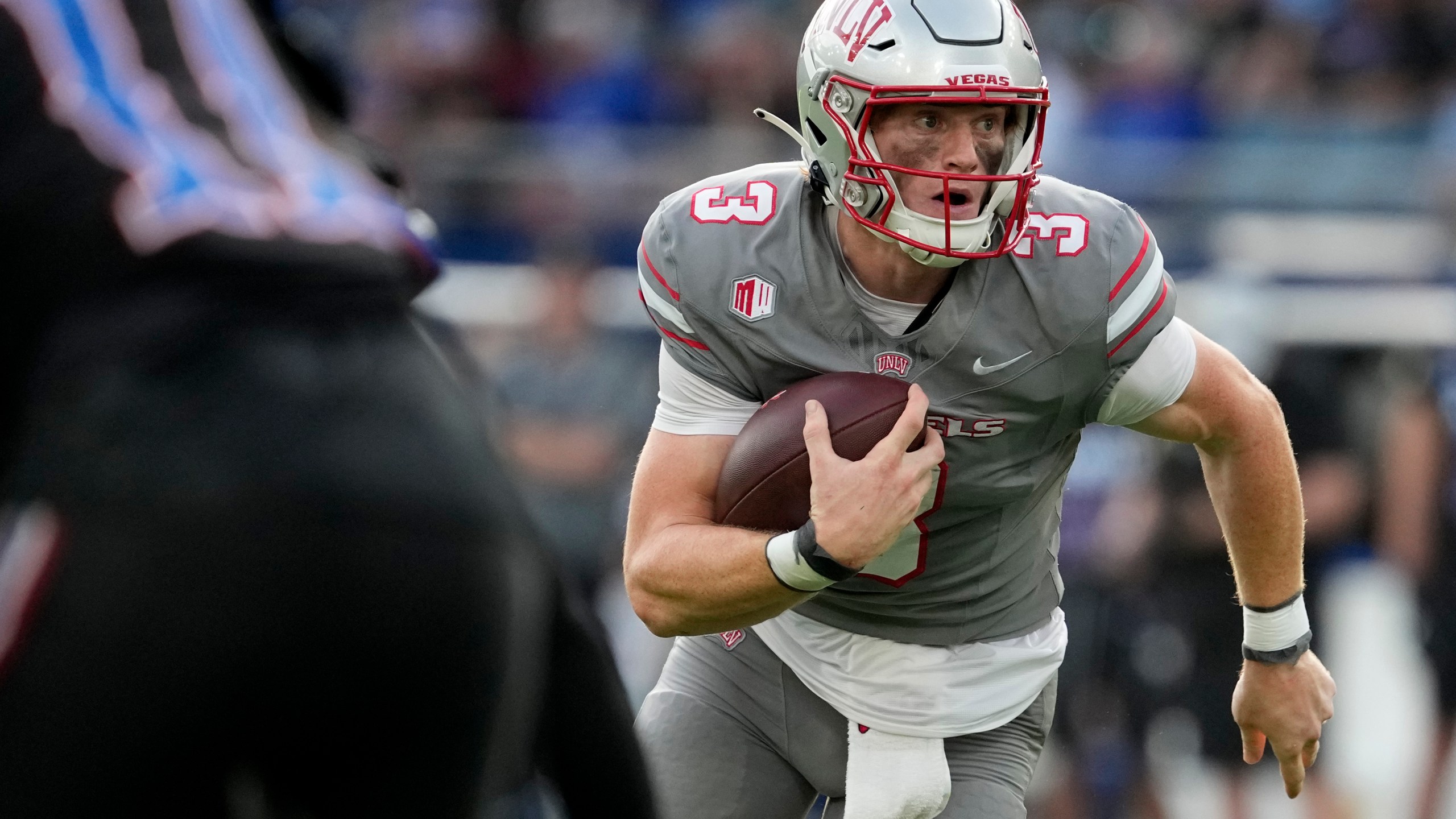 FILE - UNLV quarterback Matthew Sluka runs the ball against Kansas in the first half of an NCAA college football game Friday, Sept. 13, 2024, at Children's Mercy Park in Kansas City, Kan. (AP Photo/Ed Zurga, File)