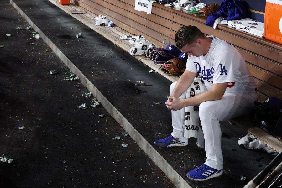 Evan Phillips of the Los Angeles Dodgers reacts in the dugout after being defeated by the Arizona Diamondbacks in Game 2 of the NLDS at Dodger Stadium on October 09, 2023 in Los Angeles. (Getty Images)